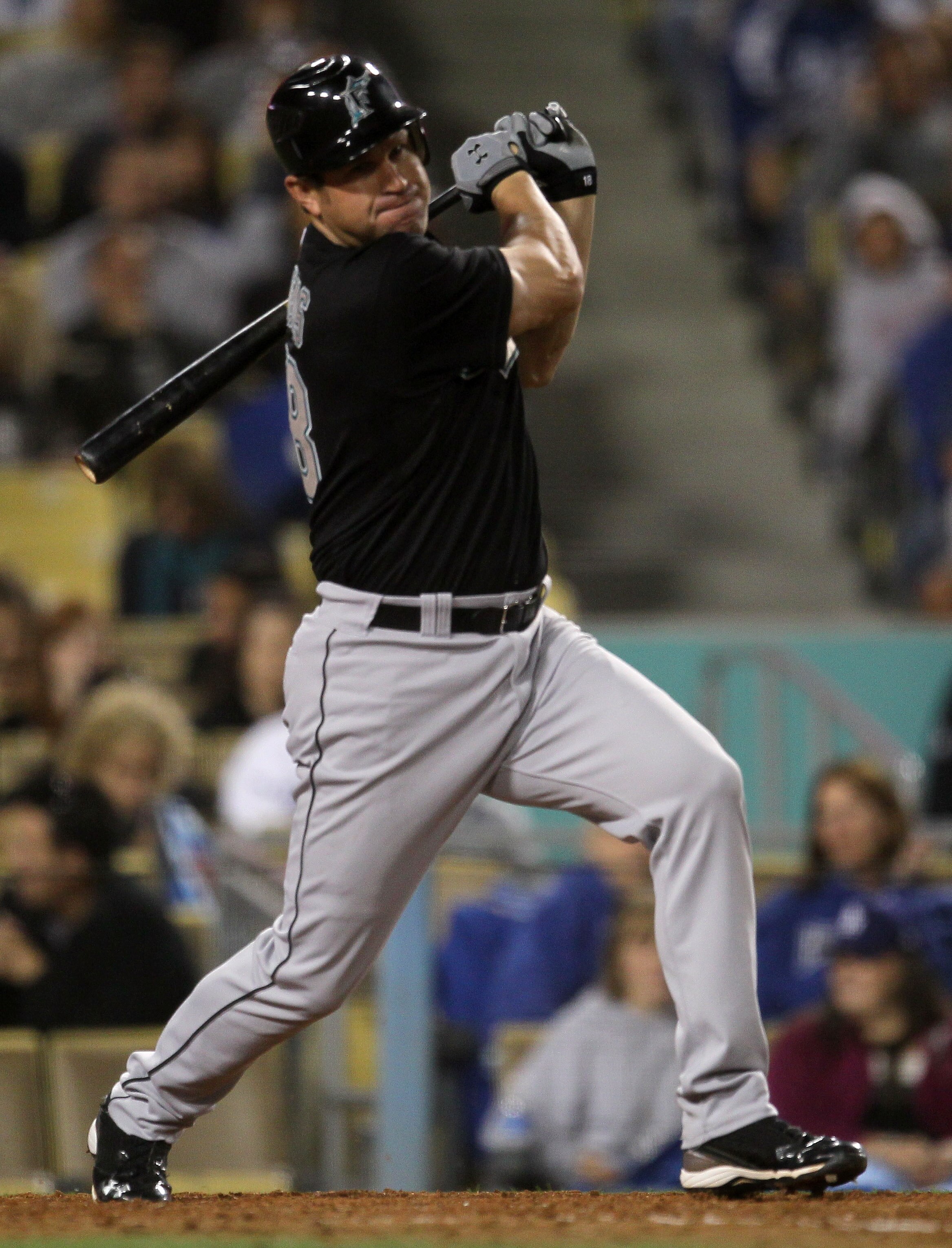 LOS ANGELES, CA - MAY 28:  Pinch hitter Wes Helms #18 of the Florida Marlins hits a two RBI double down the first base line in the sixth inning against the Los Angeles Dodgers on May 28, 2011 at Dodger Stadium in Los Angeles, California.  (Photo by Stephe