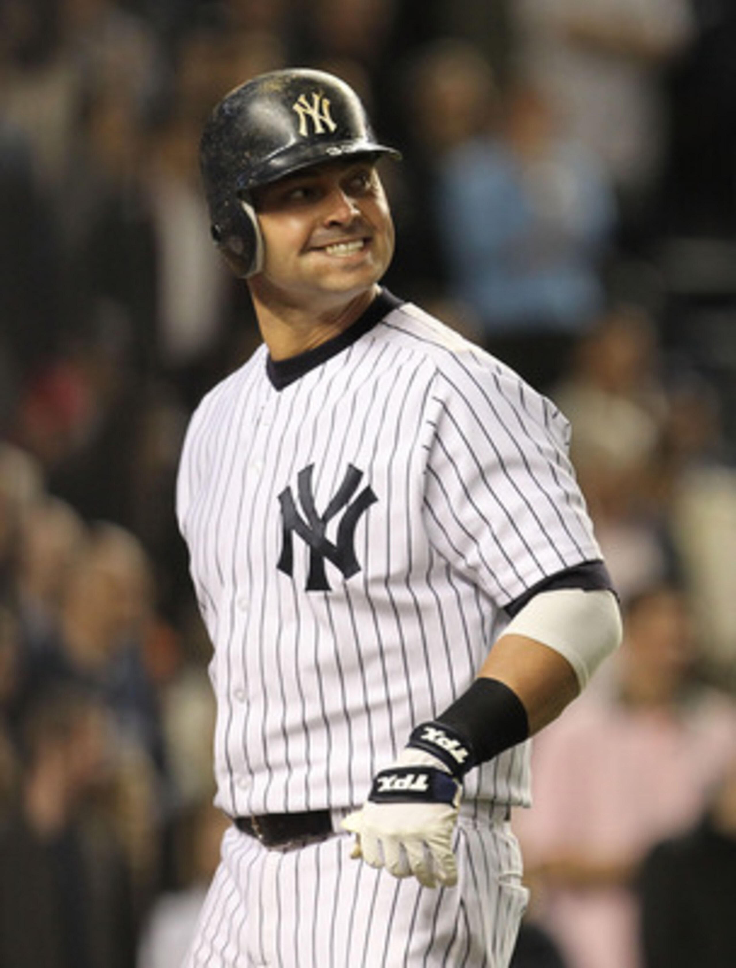 NEW YORK, NY - MAY 13:  Nick Swisher #33 of the New York Yankees reacts after striking out with two men on base against the Boston Red Sox during the eigth inning of their game on May 13, 2011 at Yankee Stadium in the Bronx borough of New York City.  (Pho