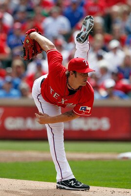 ARLINGTON, TX - APRIL 01:  Starting pitcher C.J. Wilson, #36 of the Texas Rangers, throws against the Boston Red Sox on Opening Day at Rangers Ballpark in Arlington on April 1, 2011 in Arlington, Texas.  (Photo by Tom Pennington/Getty Images)