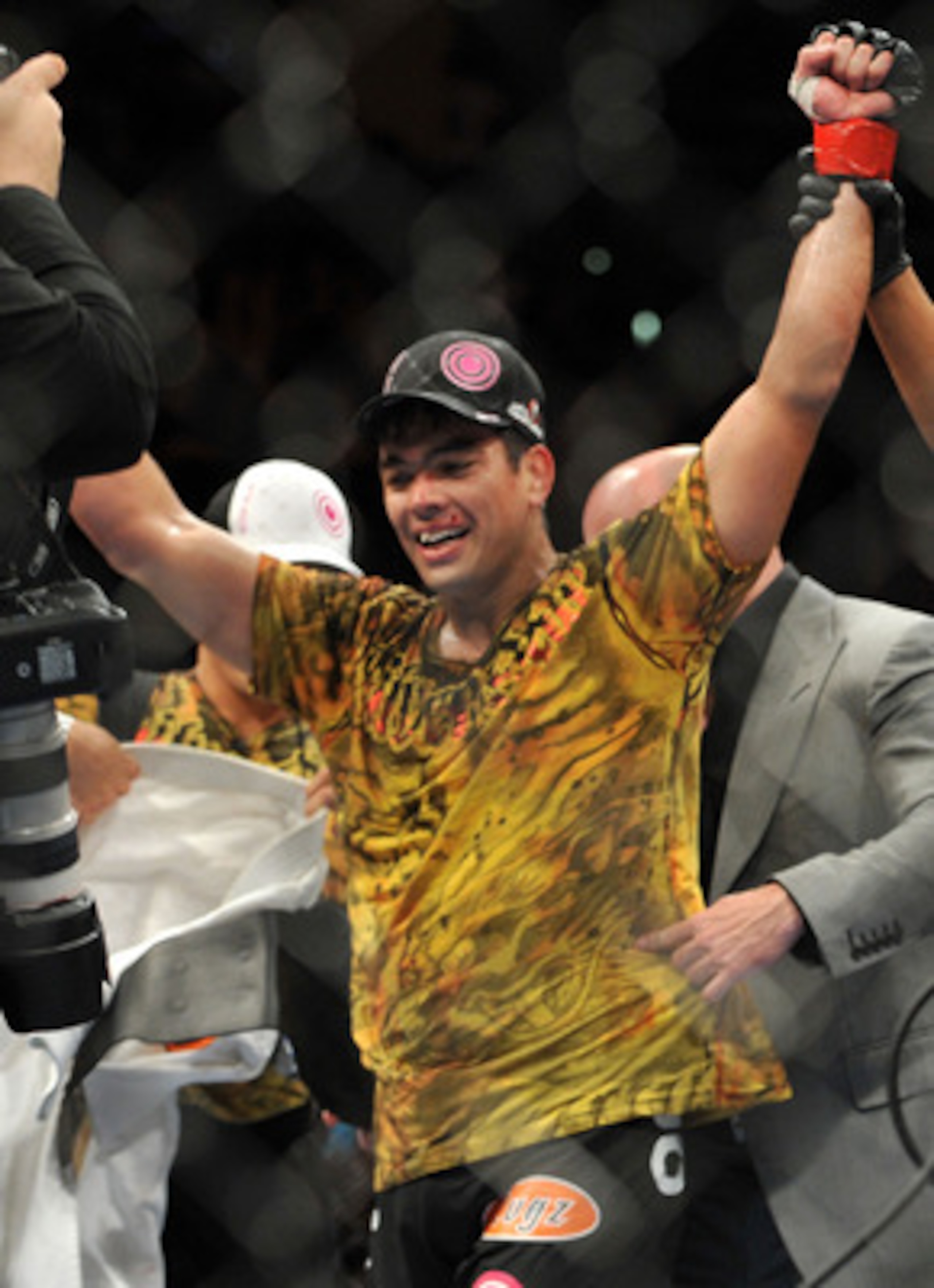 LOS ANGELES, CA - OCTOBER 24:  UFC Light Heavyweight Champion Lyoto Machida celebrates his victory over UFC Light Heavyweight challenger Mauricio Rua (not pictured) in their title fight at UFC 104 at Staples Center on October 24, 2009 in Los Angeles, Cali