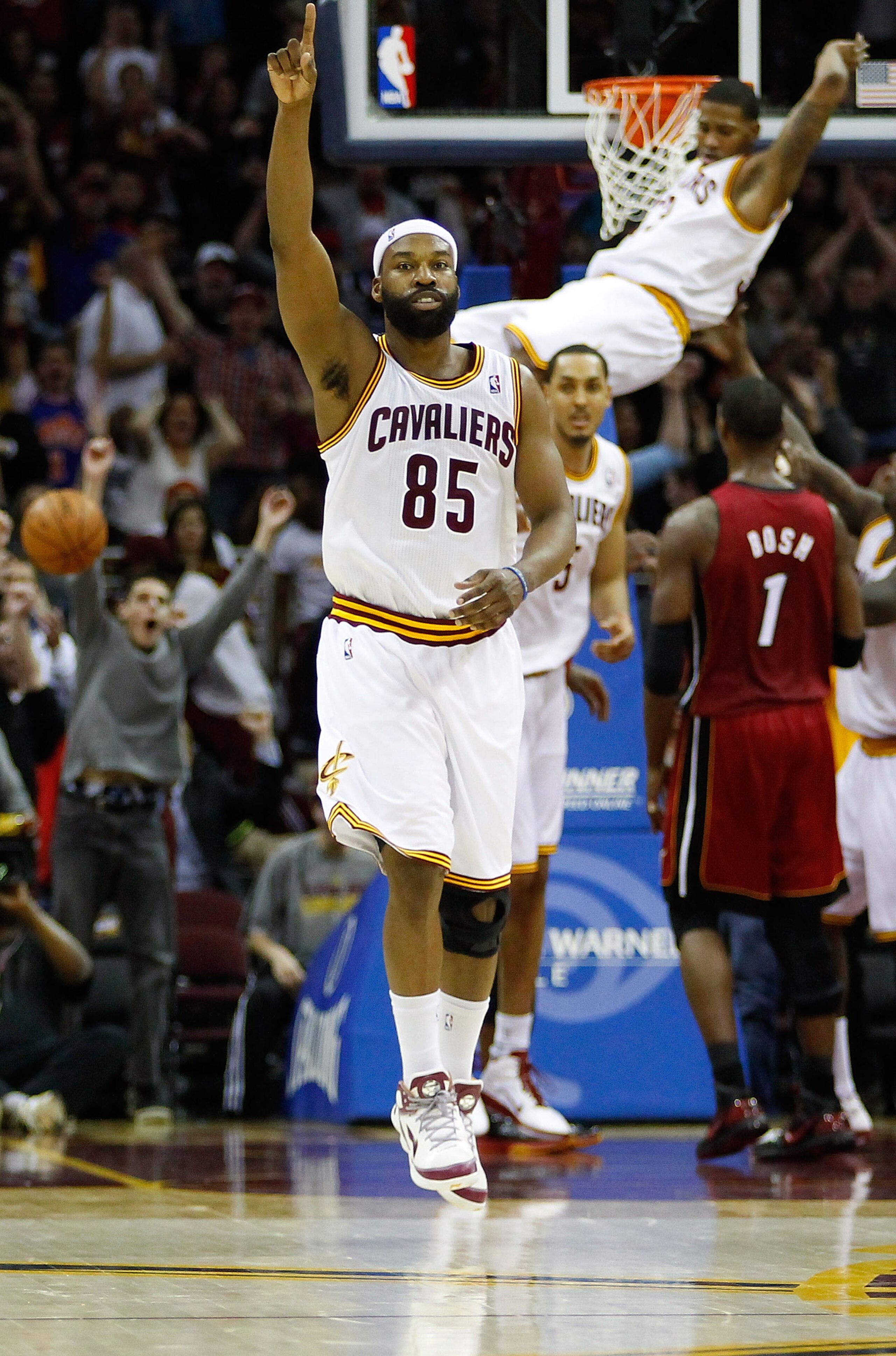 CLEVELAND - MARCH 29: Baron Davis #85 of the Cleveland Cavaliers celebrates after his team scored against the Miami Heat during the game against the Cleveland Cavaliers on March 29, 2011 at Quicken Loans Arena in Cleveland, Ohio. NOTE TO USER: User expres CLEVELAND - MARCH 29: Baron Davis #85 of the Cleveland Cavaliers celebrates after his team scored against the Miami Heat during the game against the Cleveland Cavaliers on March 29, 2011 at Quicken Loans Arena in Cleveland, Ohio. NOTE TO USER: User expres