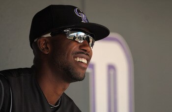 DENVER, CO - APRIL 17:  Dexter Fowler #24 of the Colorado Rockies looks on from the dugout prior to facing the Chicago Cubs at Coors Field on April 17, 2011 in Denver, Colorado.  (Photo by Doug Pensinger/Getty Images)