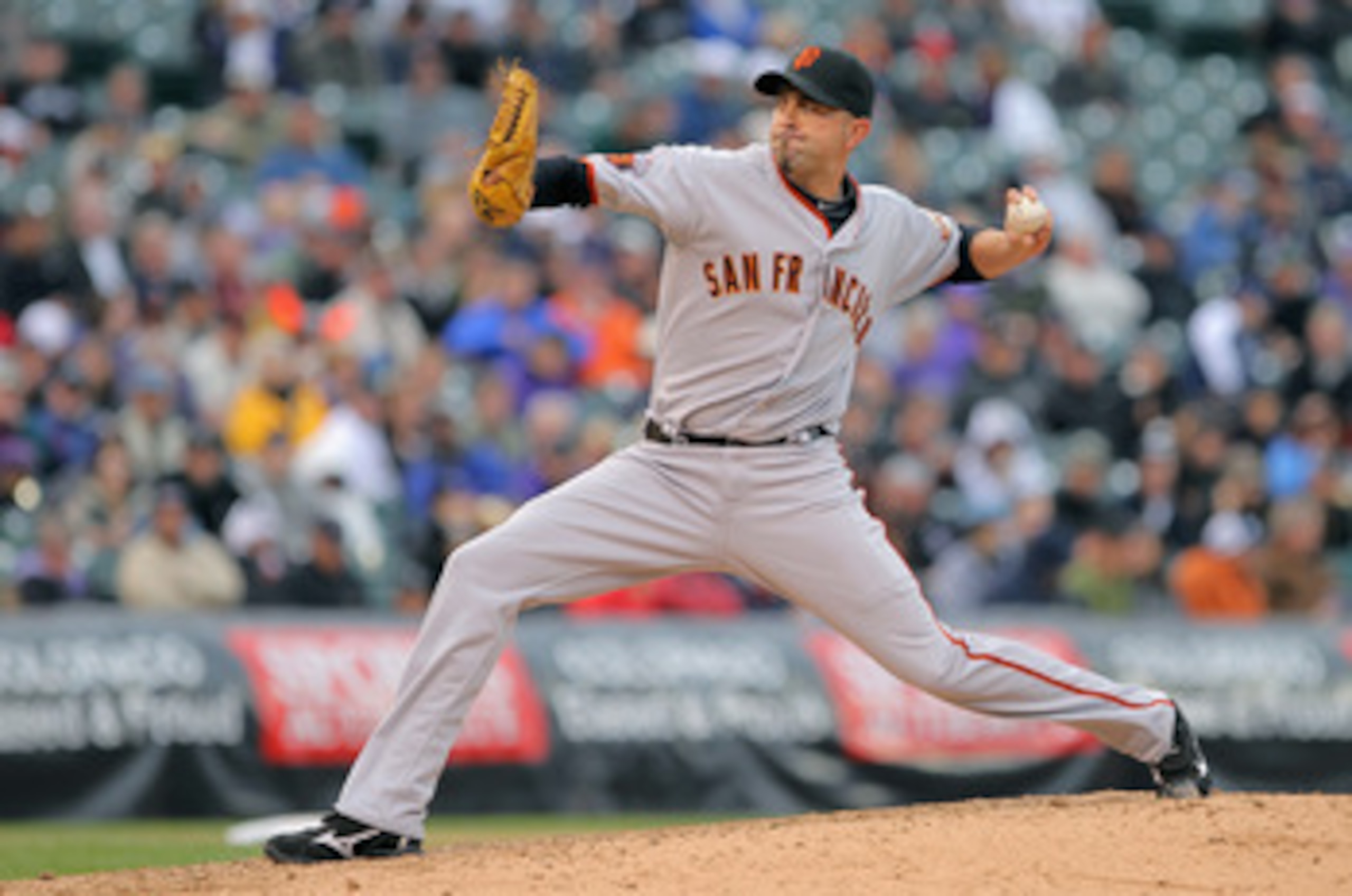 DENVER, CO - APRIL 20:  Relief pitcher Jeremy Affeldt #41 of the San Francisco Giants delivers against the Colorado Rockies at Coors Field on April 20, 2011 in Denver, Colorado.  (Photo by Doug Pensinger/Getty Images)