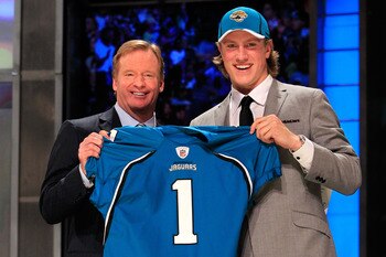 NEW YORK, NY - APRIL 28:  NFL Commissoner Roger Goodell poses for a photo with Blaine Gabbert, #11 overall pick by the Jacksonville Jaguars, holds up a jersey during the 2011 NFL Draft at Radio City Music Hall on April 28, 2011 in New York City.  (Photo b