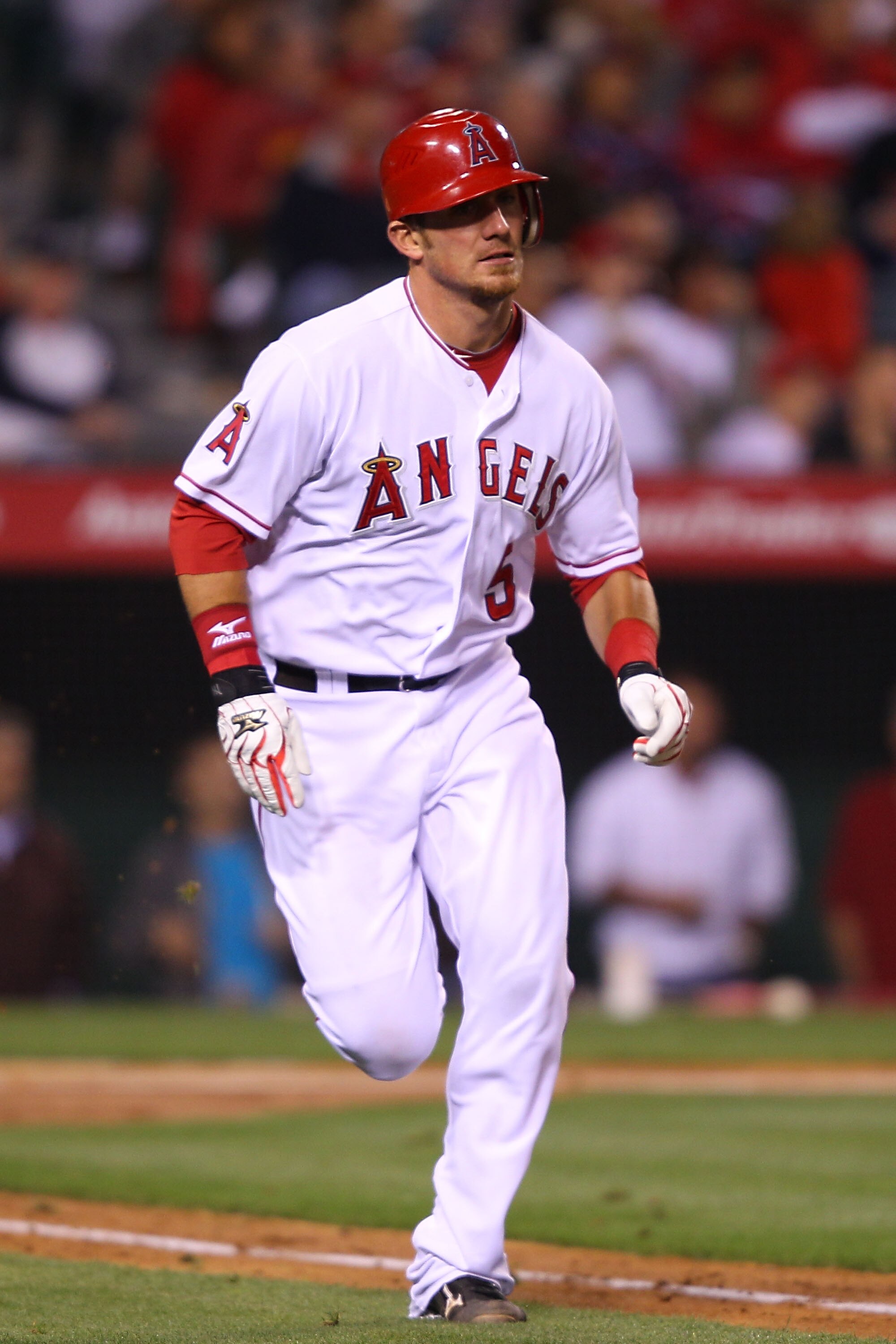 ANAHEIM, CA - MAY 23:  Jeff Mathis #5 of the Los Angeles Angeles of Anaheim runs to first base during the game against the Oakland Athletics at Angel Stadium on May 23, 2011 in Anaheim, California.  (Photo by Joe Scarnici/Getty Images)