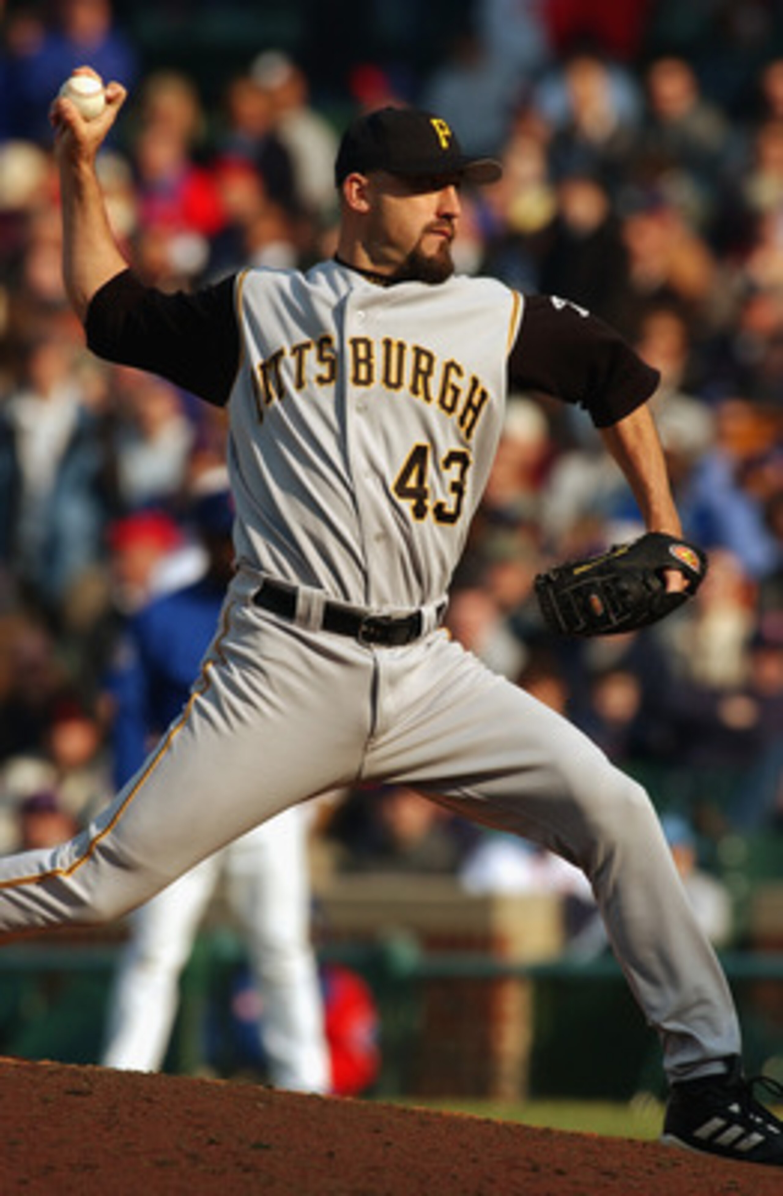 CHICAGO - APRIL 11: Relief pitcher Mike Williams #43 of the Pittsburgh Pirates notches his fifth save of the season against the Chicago Cubs at Wrigley Field on April 11, 2003 in Chicago, Illinois. The Pirates defeated the Cubs 3-2.  (Photo by Jonathan Da