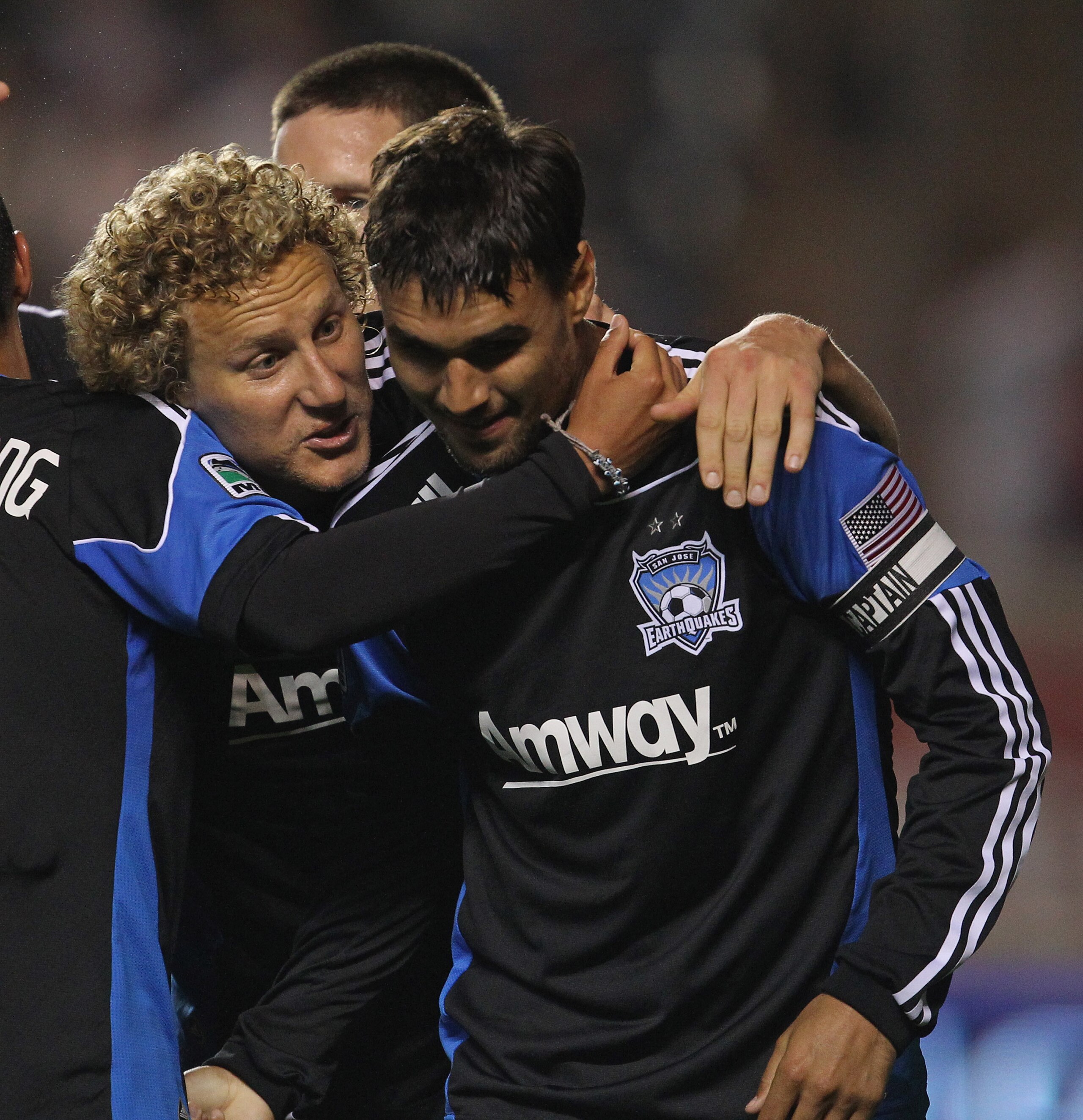 BRIDGEVIEW, IL - MAY 28: Steven Lenhart #24 of the San Jose Earthquakes (L) hugs teammate Chris Wondolowski #8 as they celebrate Wondolowski's goal against the Chicago Fire during an MLS match at Toyota Park on May 28, 2011 in Bridgeview, Illinois. The Fi
