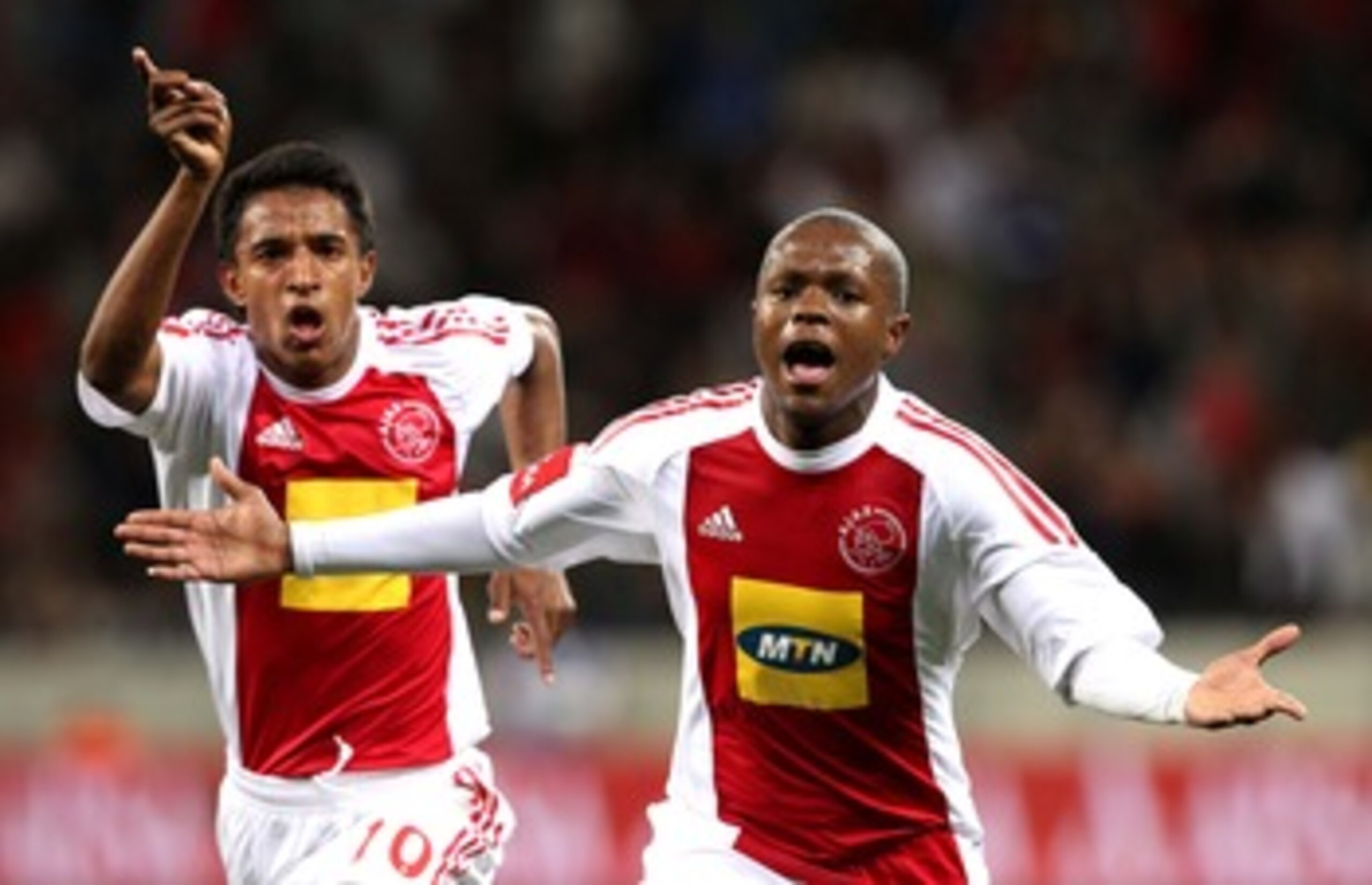 CAPE TOWN, SOUTH AFRICA - AUGUST 27: Thulani Serero from Ajax CT celebrates his goal during the Absa Premiership match between Ajax Cape Town and Blomfontein Celtic at Cape Town Stadium on August 27: 2010 in Cape Town, South Africa. (Photo by Carl Fourie/