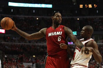 CHICAGO, IL - MAY 18:  LeBron James #6 of the Miami Heat looks to pass against Luol Deng #9 of the Chicago Bulls in Game Two of the Eastern Conference Finals during the 2011 NBA Playoffs on May 18, 2011 at the United Center in Chicago, Illinois. NOTE TO U