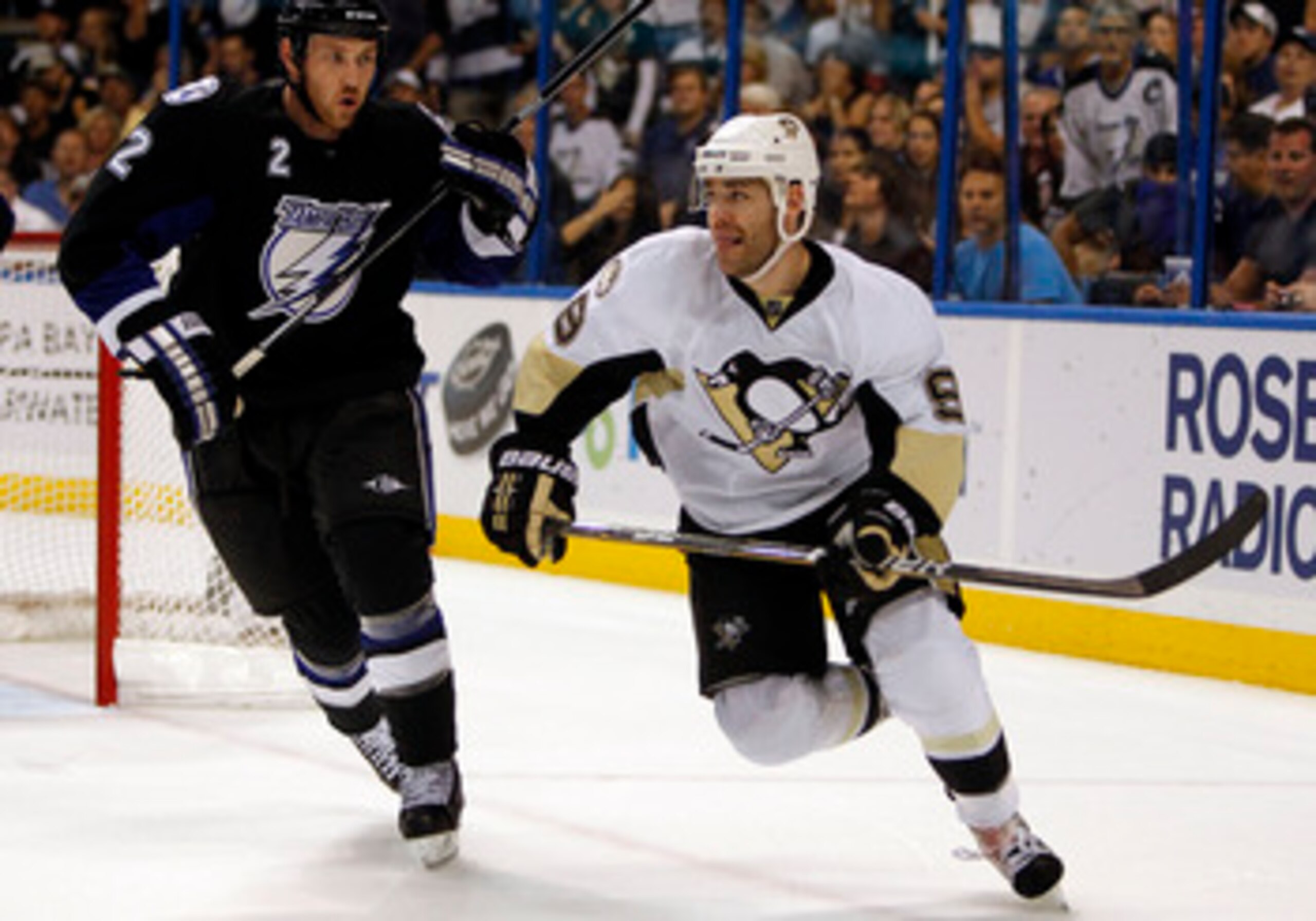 TAMPA, FL - APRIL 20: Pascal Dupuis #9 of the Pittsburgh Penguins skates for possession against Eric Brewer #2 of the Tampa Bay Lightning in Game Four of the Eastern Conference Quarterfinals during the 2011 NHL Stanley Cup Playoffs at the St. Pete Times F TAMPA, FL - APRIL 20: Pascal Dupuis #9 of the Pittsburgh Penguins skates for possession against Eric Brewer #2 of the Tampa Bay Lightning in Game Four of the Eastern Conference Quarterfinals during the 2011 NHL Stanley Cup Playoffs at the St. Pete Times F