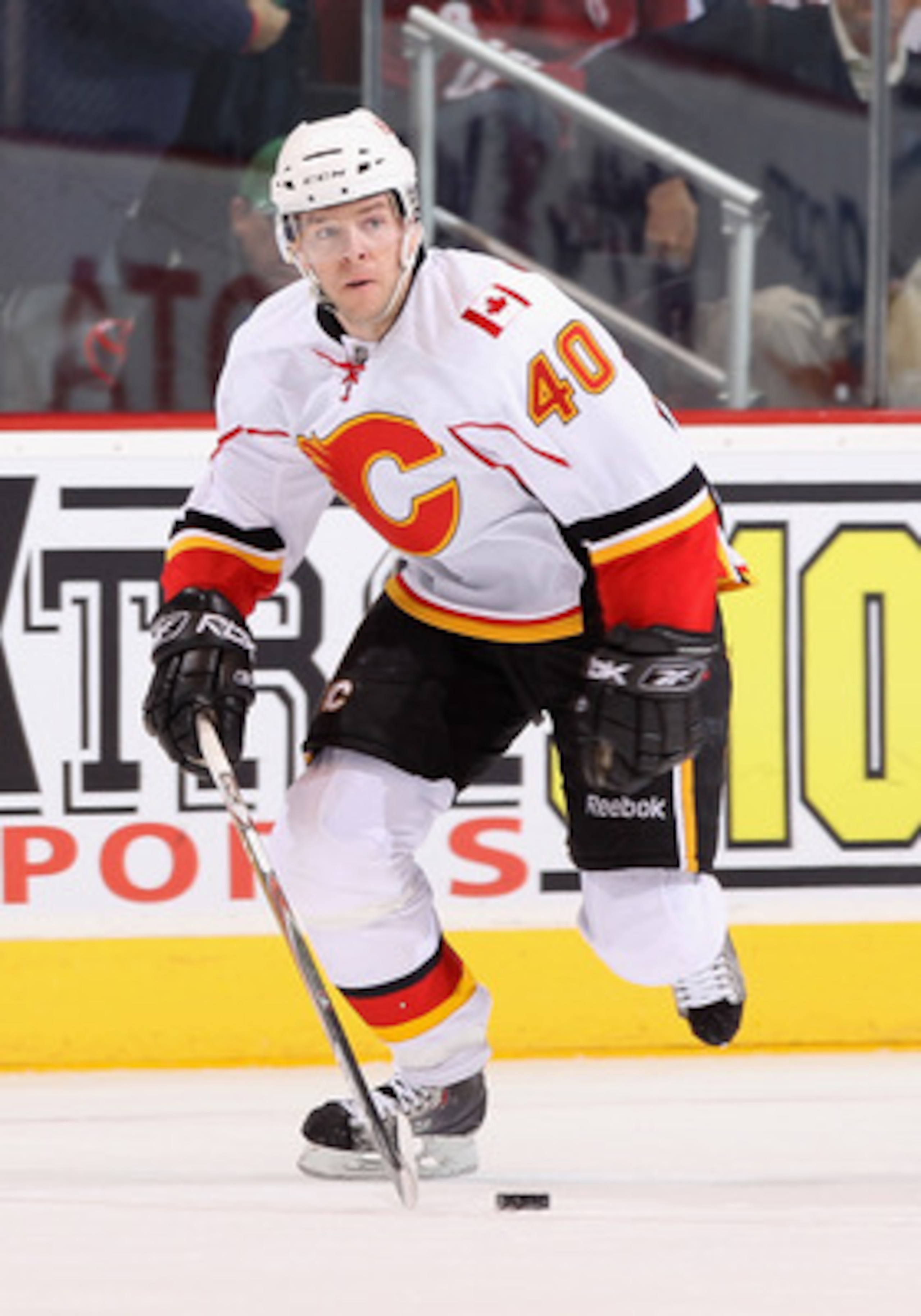 GLENDALE, AZ - MARCH 10: Alex Tanguay #40 of the Calgary Flames skates with the puck during the NHL game against the Phoenix Coyotes at Jobing.com Arena on March 10, 2011 in Glendale, Arizona. The Coyotes defeated the Flames 3-0. (Photo by Christian Pe GLENDALE, AZ - MARCH 10: Alex Tanguay #40 of the Calgary Flames skates with the puck during the NHL game against the Phoenix Coyotes at Jobing.com Arena on March 10, 2011 in Glendale, Arizona. The Coyotes defeated the Flames 3-0. (Photo by Christian Pe