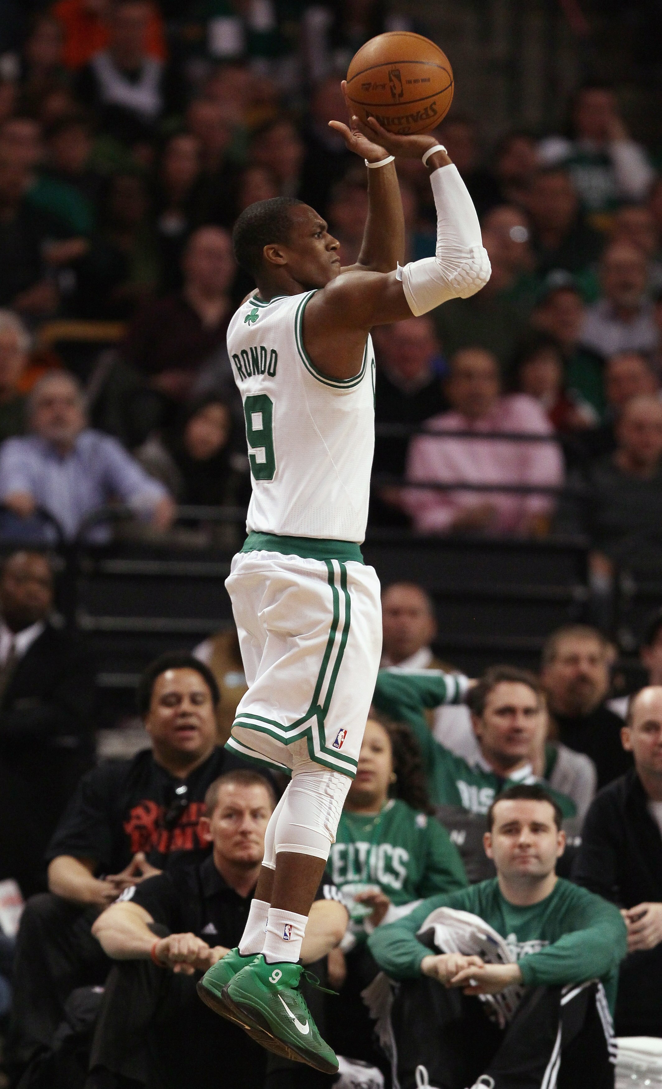 BOSTON, MA - MARCH 02:  Rajon Rondo #9 of the Boston Celtics takes a shot in the second half against the Phoenix Suns on March 2, 2011 at the TD Garden in Boston, Massachusetts.  The Celtics defeated the Suns 115-103. NOTE TO USER: User expressly acknowle
