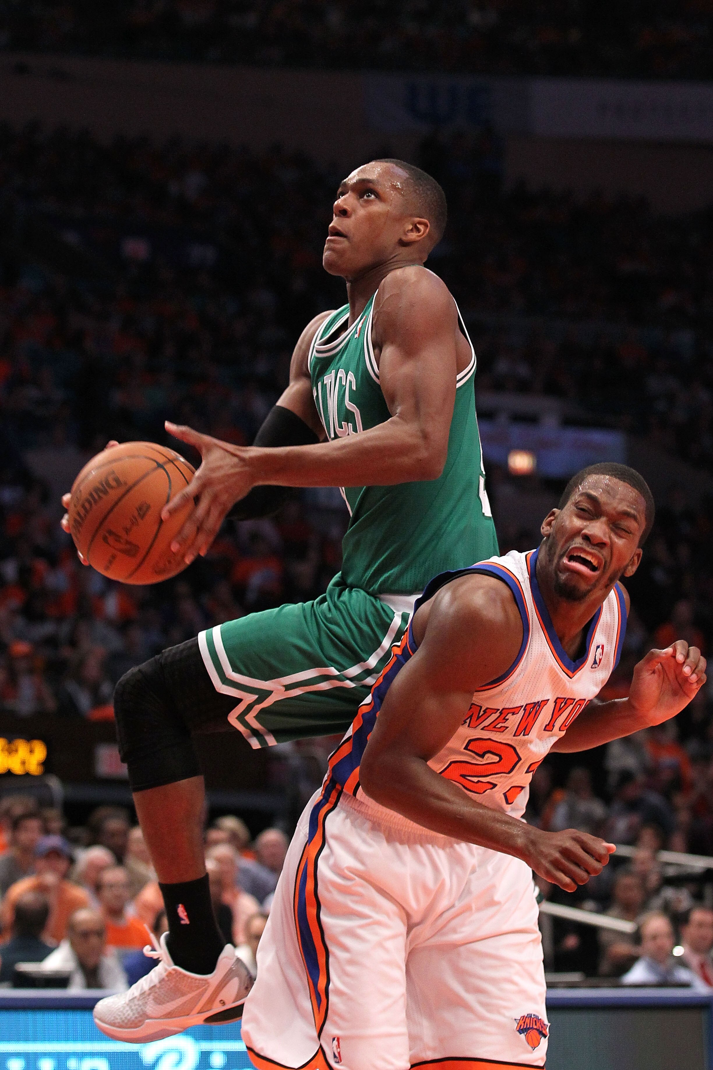 NEW YORK, NY - APRIL 24:  Rajon Rondo #9 of the Boston Celtics drives for a shot attempt against Toney Douglas #23 of the New York Knicks in Game Four of the Eastern Conference Quarterfinals during the 2011 NBA Playoffs on April 24, 2011 at Madison Square