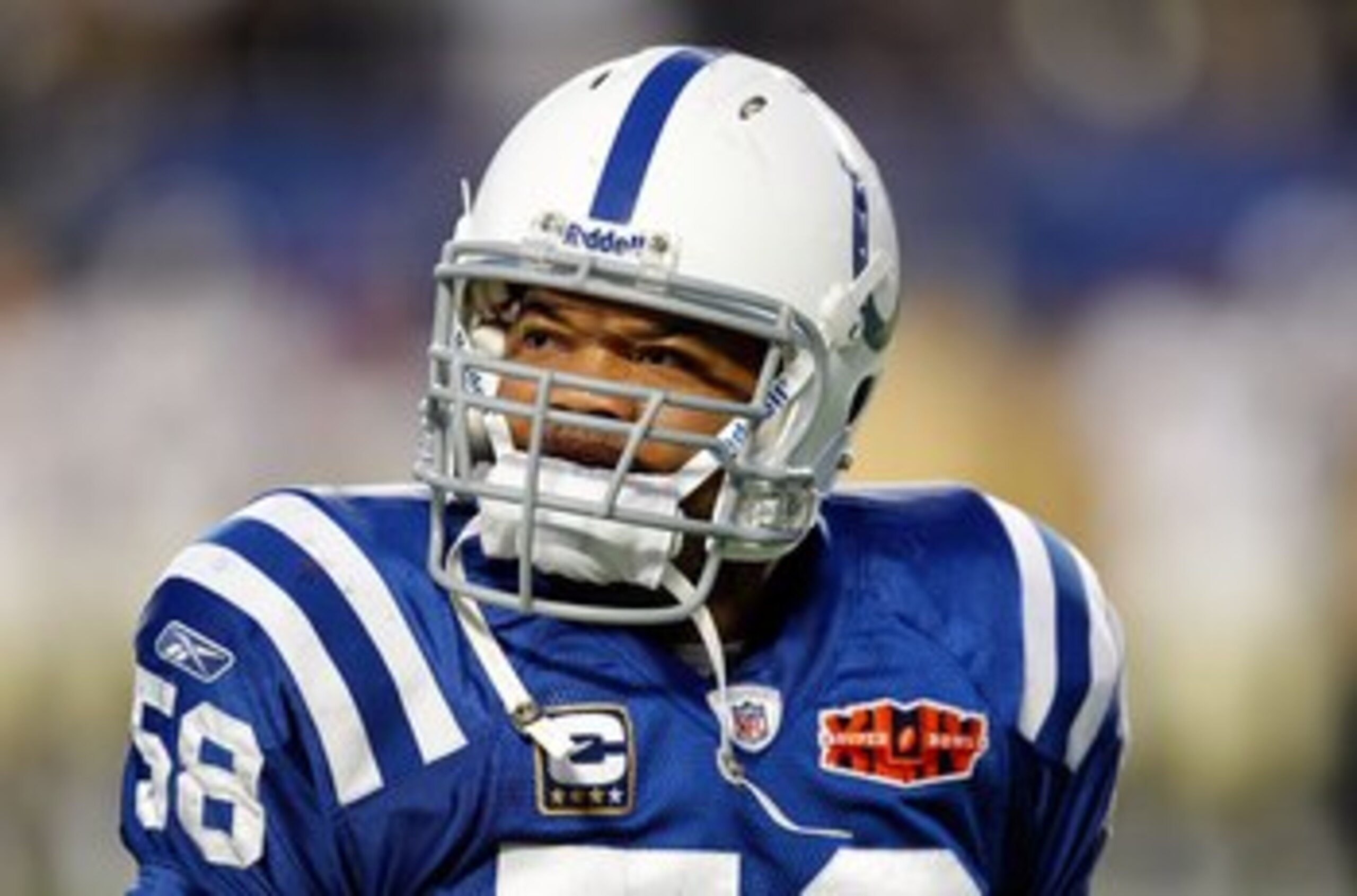 MIAMI GARDENS, FL - FEBRUARY 07:  Gary Brackett #58 of the Indianapolis Colts looks on against the New Orleans Saints during Super Bowl XLIV on February 7, 2010 at Sun Life Stadium in Miami Gardens, Florida.  (Photo by Jonathan Daniel/Getty Images)