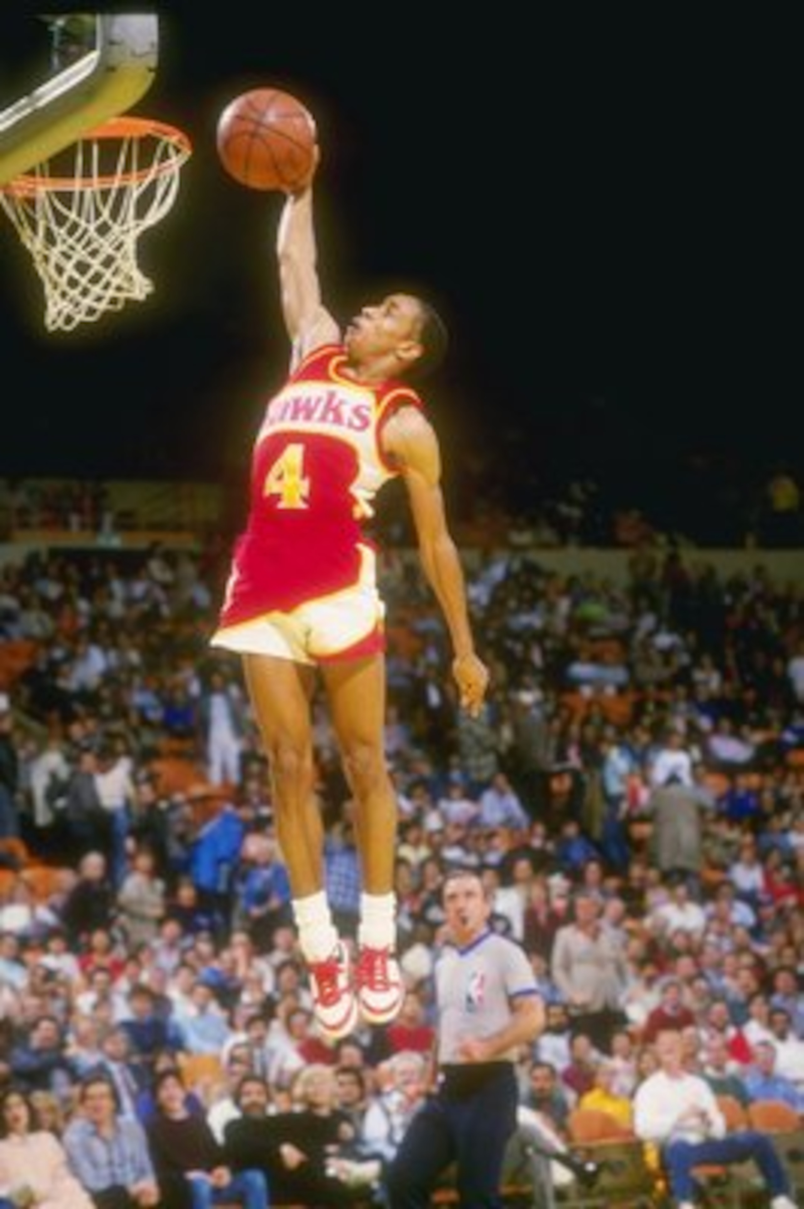 1986-1987:  Guard Anthony (Spud) Webb of the Atlanta Hawks         leaps to victory during a game against the Los Angeles Lakers at The Forum in Inglewood, California. Mandatory Credit: Stephen Dunn  /Allsport