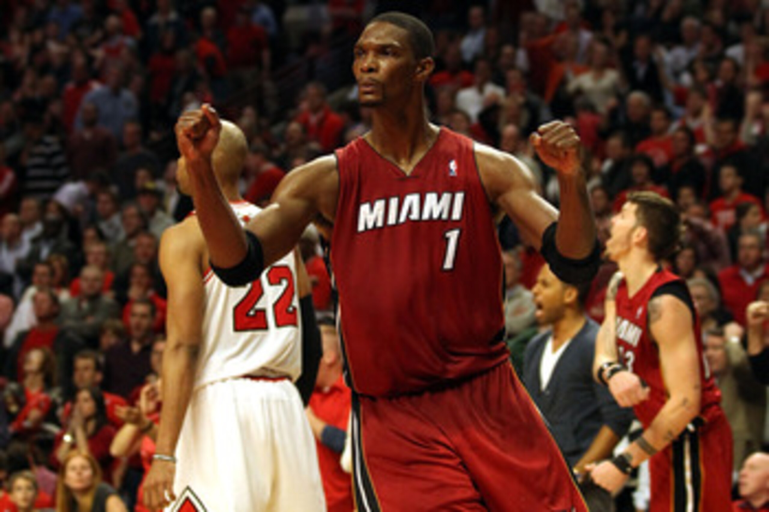 CHICAGO, IL - MAY 26:  Chris Bosh #1 of the Miami Heat celebrates after the Heat won 83-80 against the Chicago Bulls in Game Five of the Eastern Conference Finals during the 2011 NBA Playoffs on May 26, 2011 at the United Center in Chicago, Illinois. NOTE