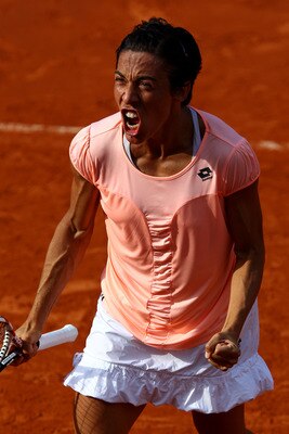PARIS, FRANCE - MAY 29:  Francesca Schiavone of Italy celebrates match point after the women's singles round four match between Jelena Jankovic of Serbia and Francesca Schiavone of Italy on day eight of the French Open at Roland Garros on May 29, 2011 in