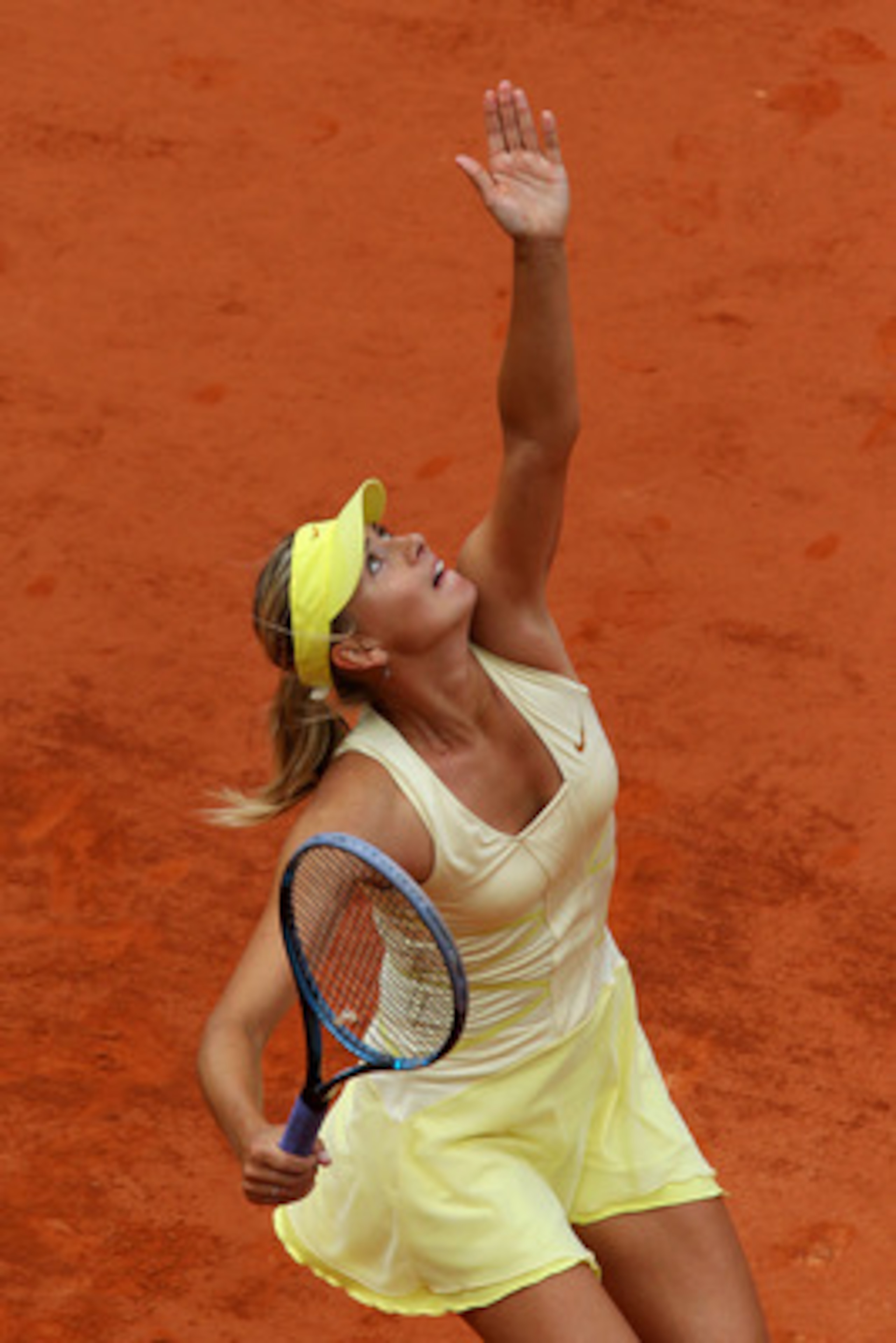 PARIS, FRANCE - MAY 26:  Maria Sharapova of Russia serves during the women's singles round two match between Maria Sharapova of Russia and Caroline Garcia of France on day five of the French Open at Roland Garros on May 26, 2011 in Paris, France.  (Photo