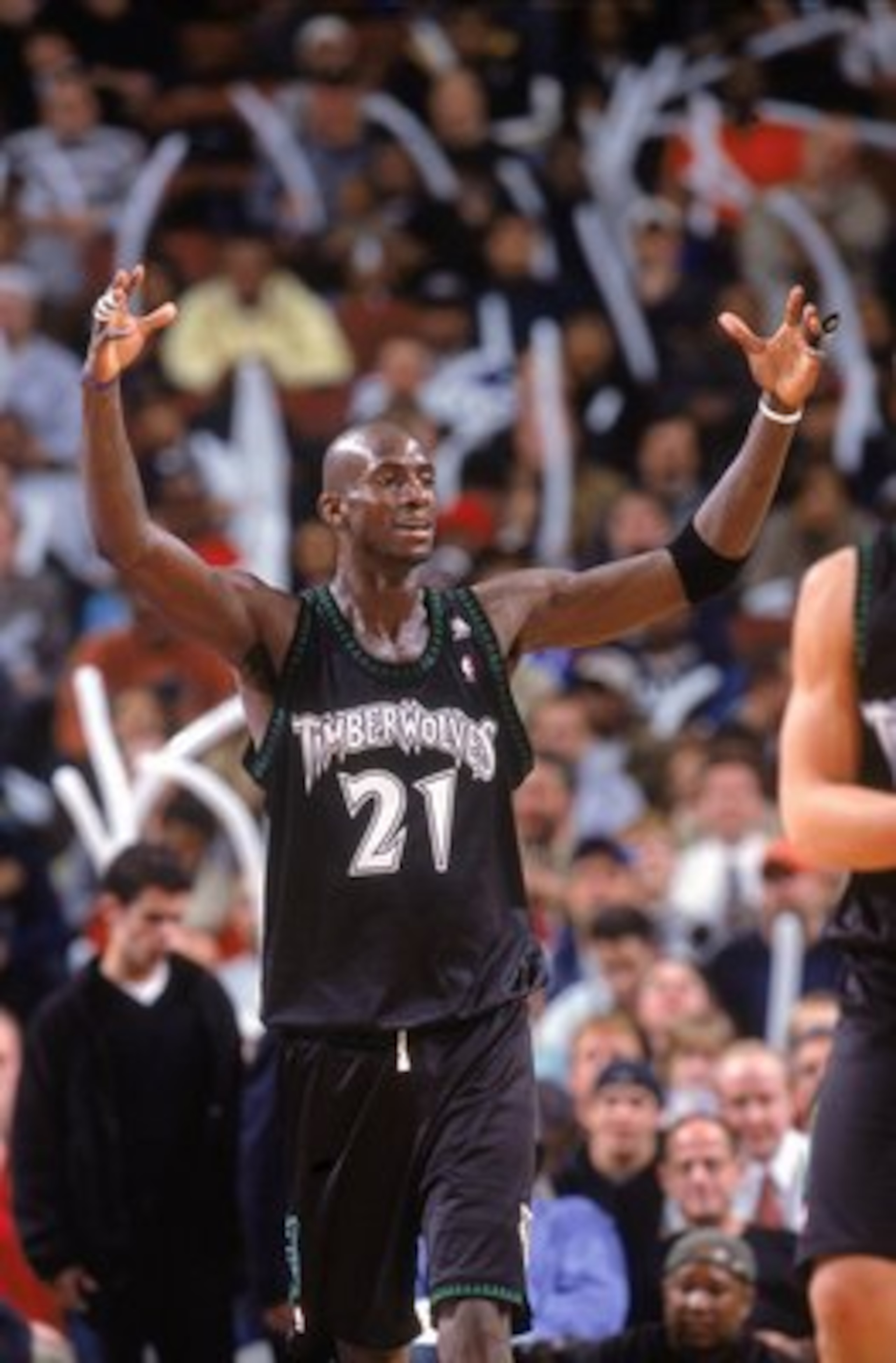 11 Dec 2000:  Kevin Garnett #21 of the Minnesota Timberwolves reacts on the court during the game against the Philadelphia 76ers at the First Union Center in Philadelphia, Pennsylvania. The Timberwolves defeated the 76ers 96-91. NOTE TO USER: It is expres