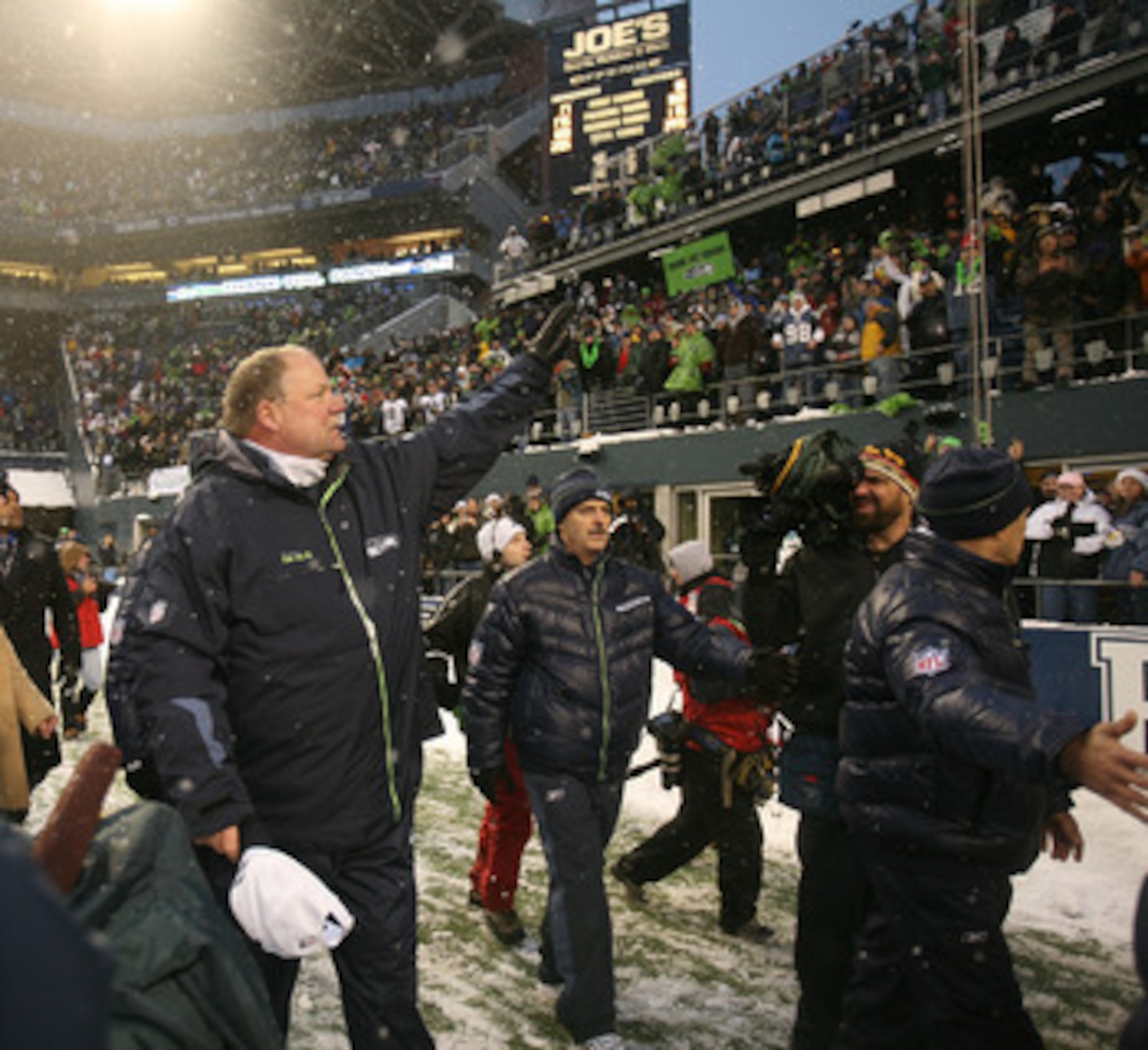 SEATTLE - DECEMBER 21:  Head coach Mike Holmgrem of the Seattle Seahawks thanks fans after his final home game as head coach against the New York Jets on December 21, 2008 at Qwest Field in Seattle, Washington. The Seahawks defeated the Jets 13-3. (Photo 