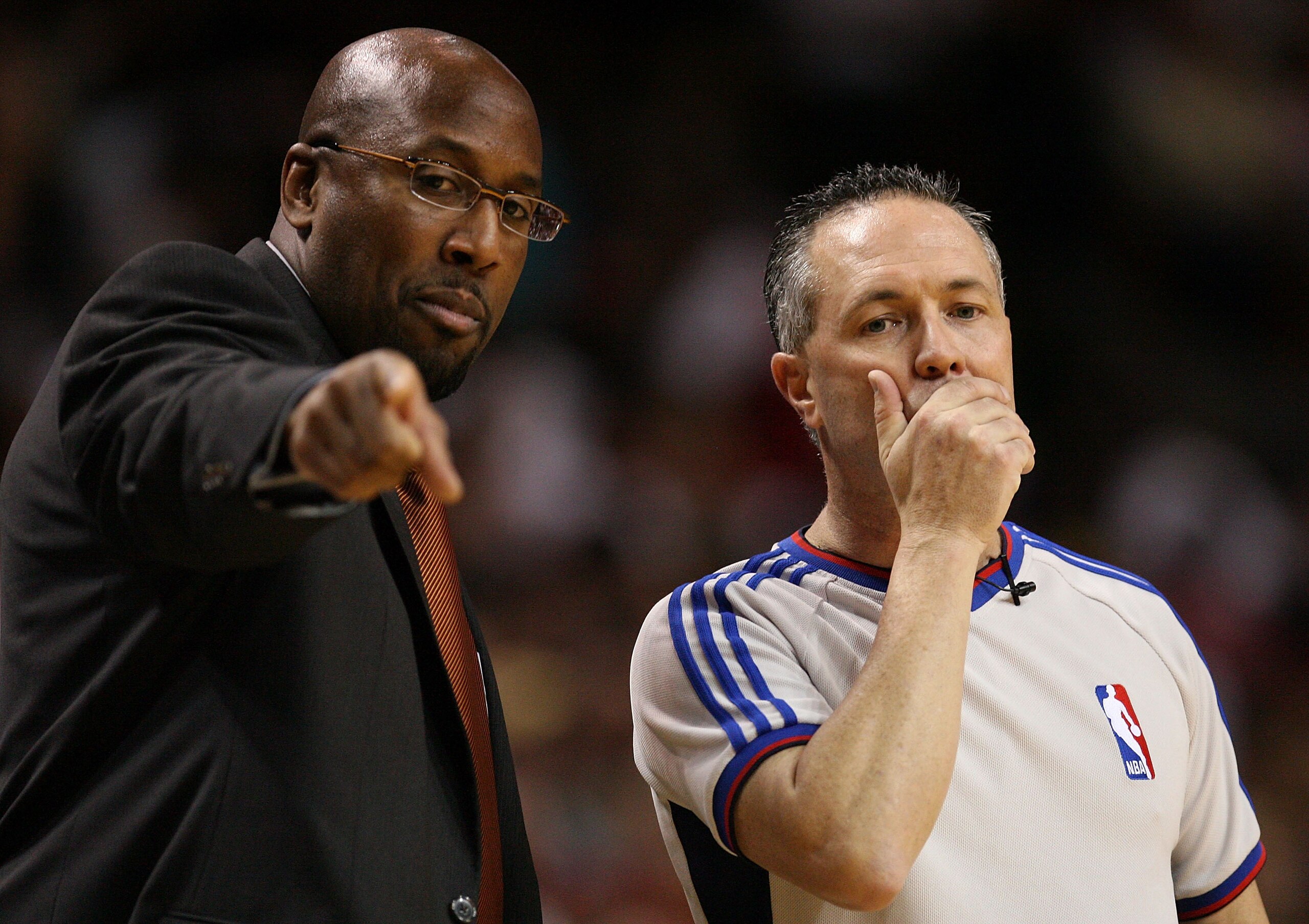 MIAMI - DECEMBER 30:  Head coach Mike Brown of the Cleveland Cavaliers discusses a call against his team with official Jason Phillips #23 while taking on the Miami Heat at American Airlines Arena on December 30, 2008 in Miami, Florida. The Heat defeated t