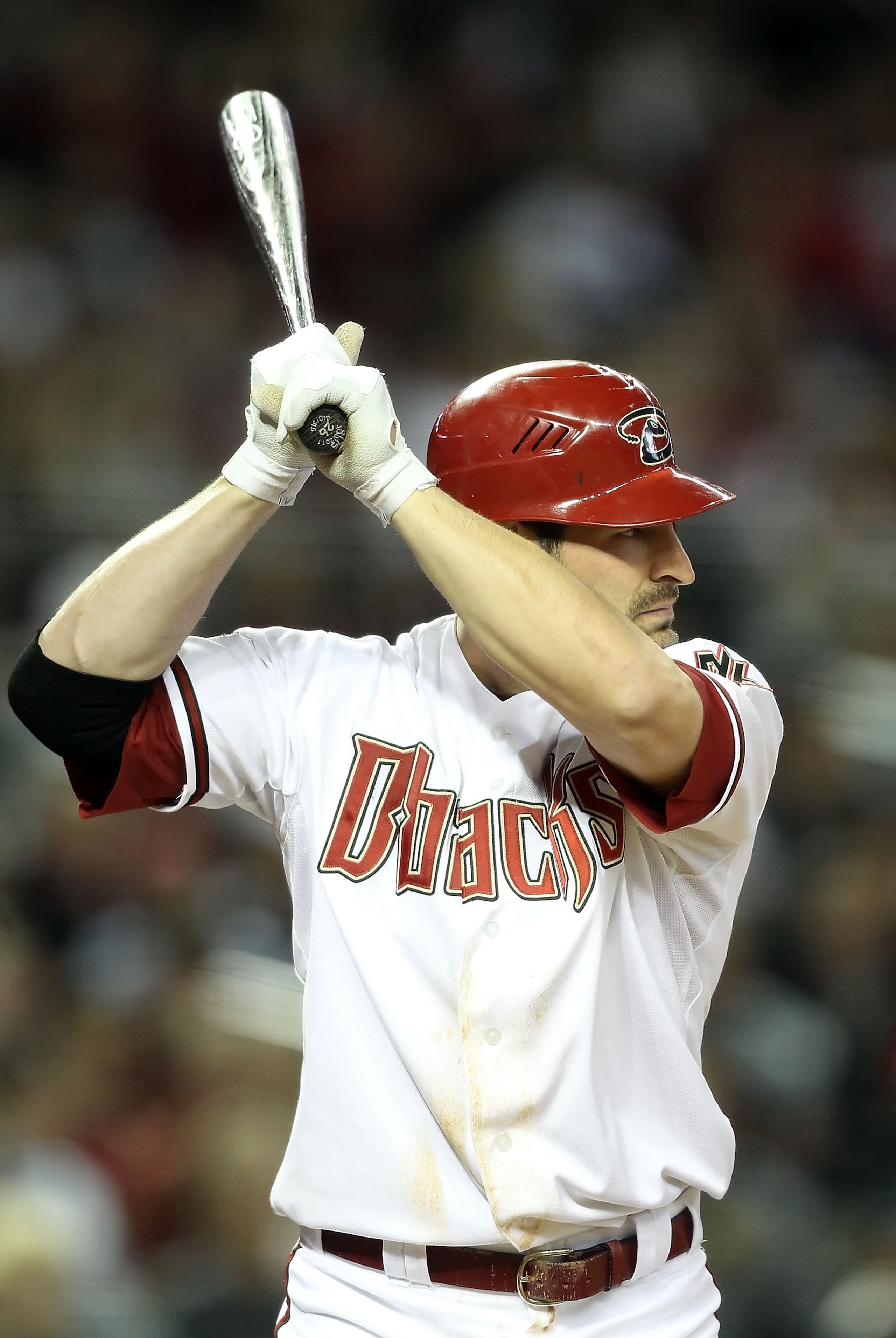 PHOENIX, AZ - APRIL 08:  Xavier Nady #22 of the Arizona Diamondbacks bats against the Cincinnati Reds during the Major League Baseball home opening game at Chase Field on April 8, 2011 in Phoenix, Arizona. The Diamondbacks defeated the Reds 13-2.  (Photo