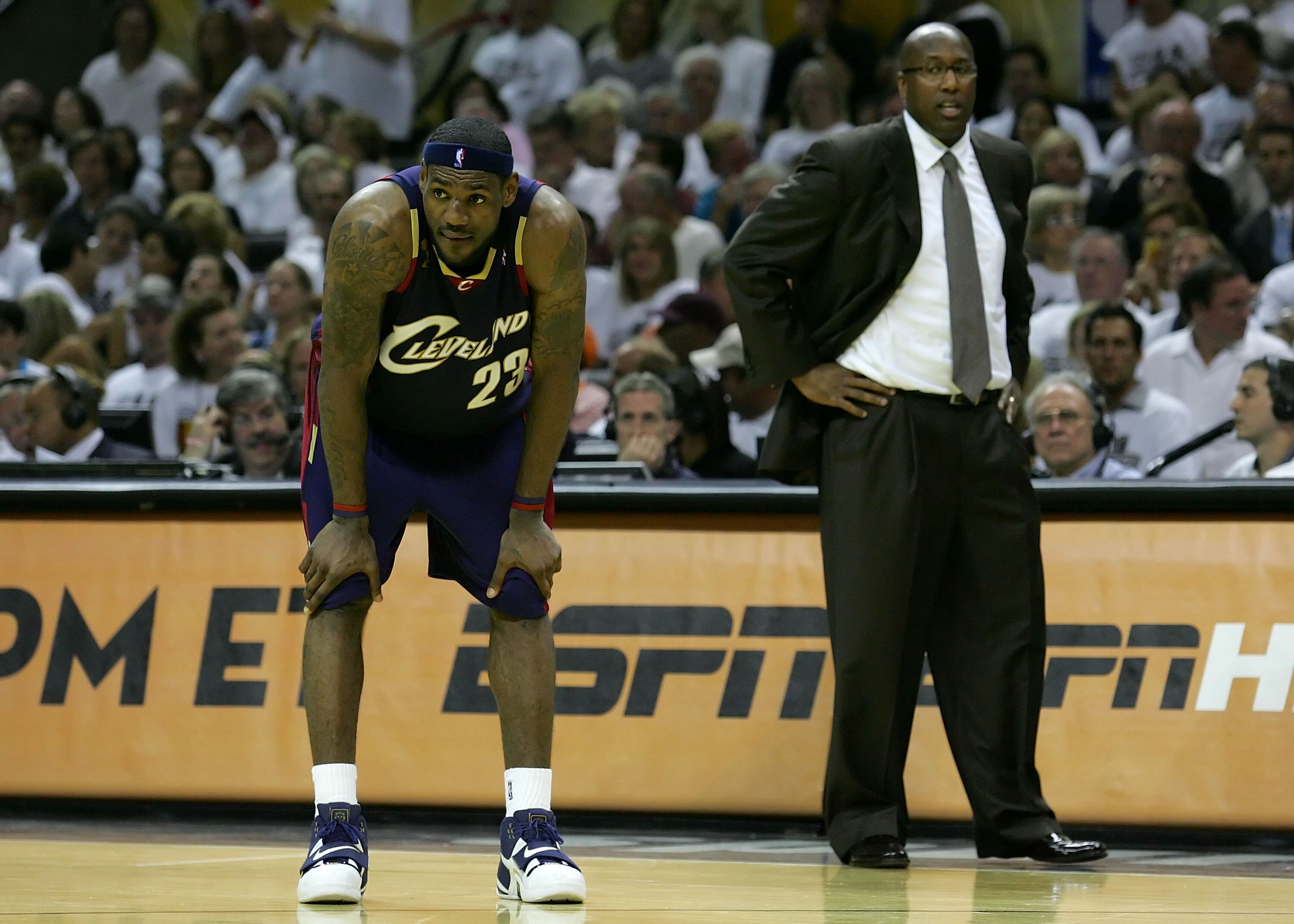 SAN ANTONIO - JUNE 07:  LeBron James #23 of the Cleveland Cavaliers looks down as head coach Mike Brown looks over at him in the second half against the San Antonio Spurs in Game One of the 2007 NBA Finals on June 7, 2007 at the AT&T Center in San Antonio