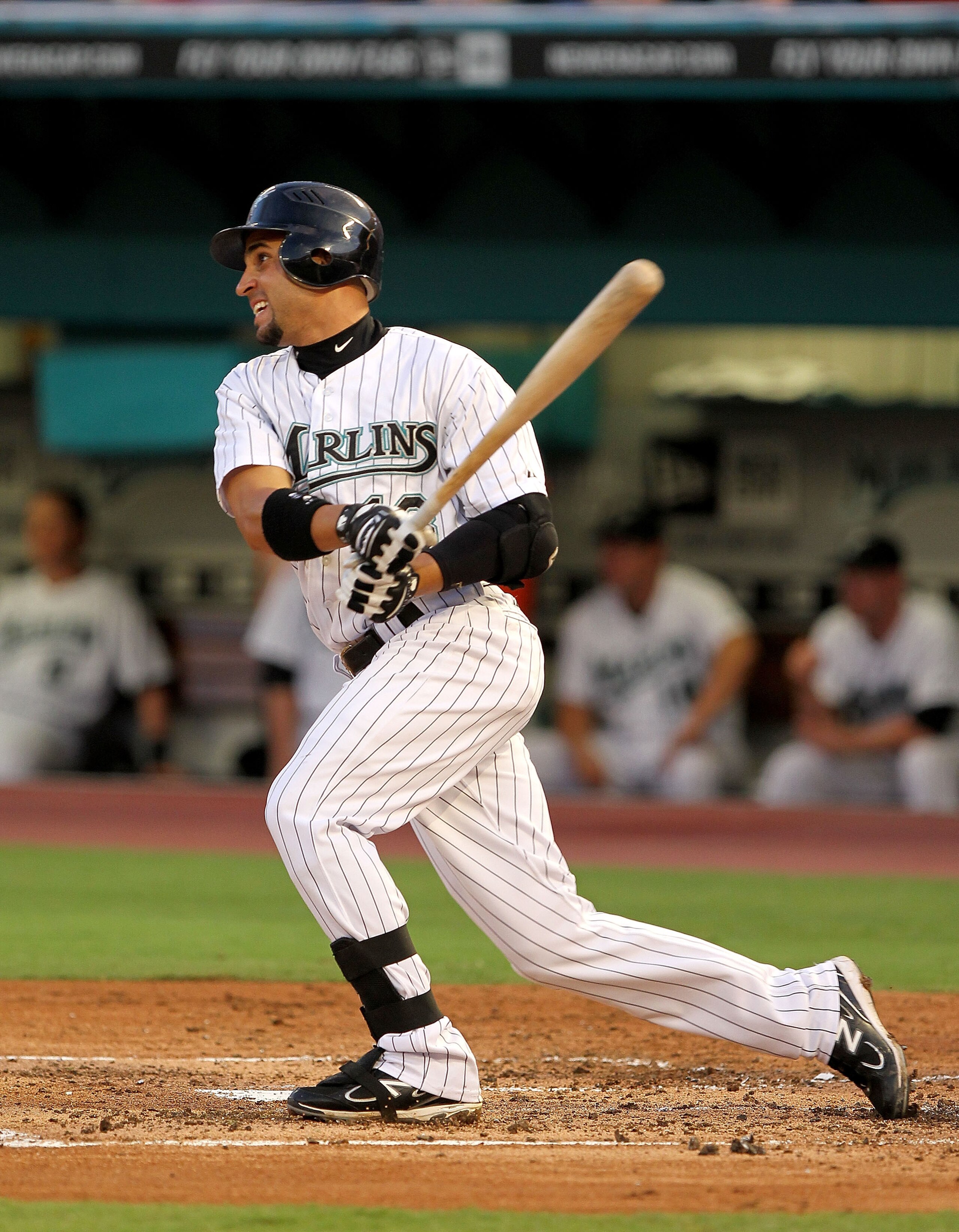 MIAMI GARDENS, FL - APRIL 21: Omar Infante #13 of the Florida Marlins hits a single during a game against the Pittsburgh Pirates at Sun Life Stadium on April 21, 2011 in Miami Gardens, Florida.  (Photo by Mike Ehrmann/Getty Images)