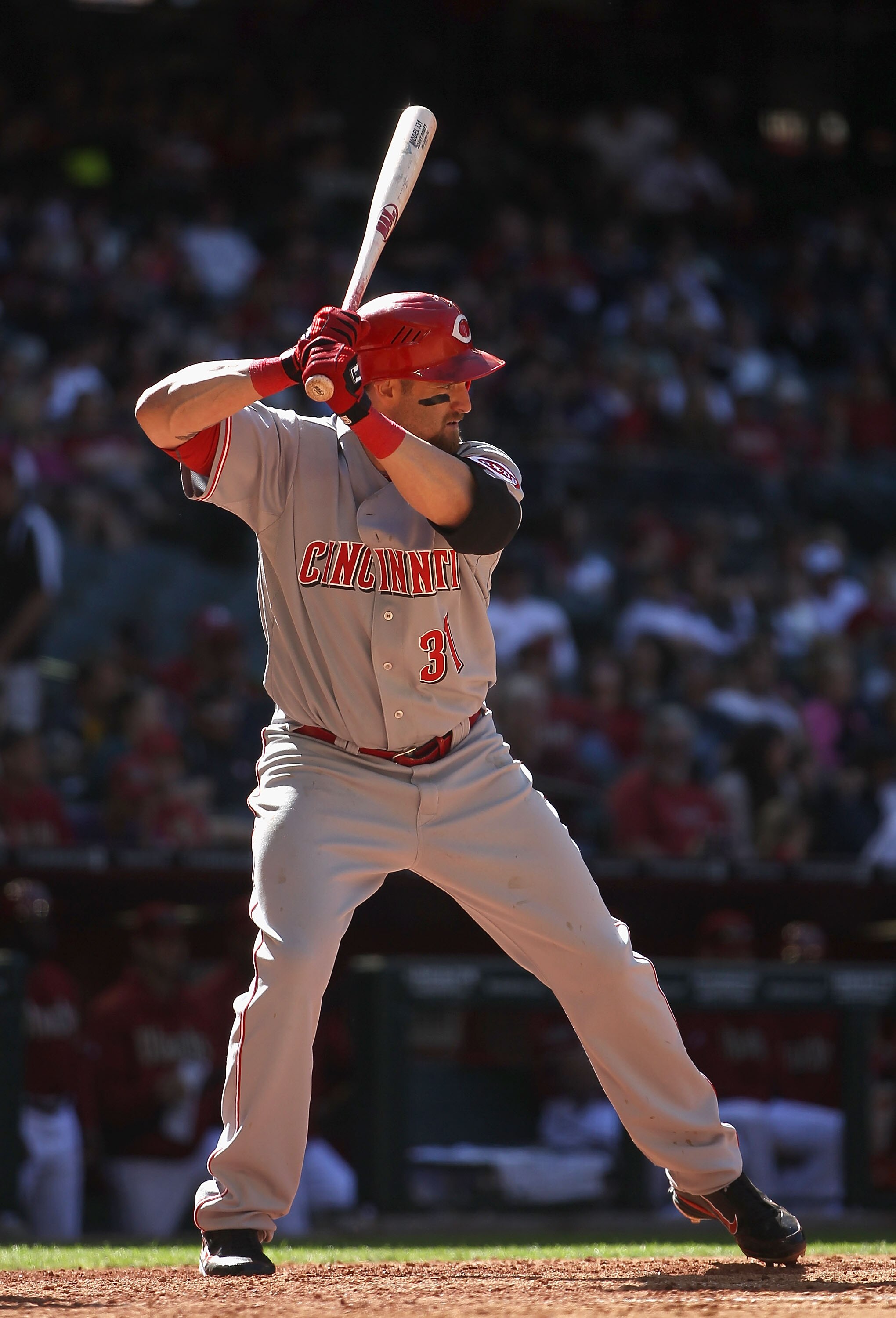 PHOENIX, AZ - APRIL 10:  Jonny Gomes #31 of the Cincinnati Reds bats against the Arizona Diamondbacks during the Major League Baseball game at Chase Field on April 10, 2011 in Phoenix, Arizona.   The Diamondbacks defeated the Reds 10-8.  (Photo by Christi