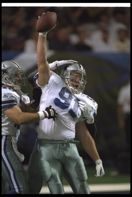 30 Jan 1994:  Linebacker Matt Vanderbeek of the Dallas Cowboys celebrates with a teammate during Super Bowl XXVIII against the Buffalo Bills at the Georgia Dome in Atlanta, Georgia.  The Cowboys won the game, 30-13. Mandatory Credit: Jonathan Daniel  /All