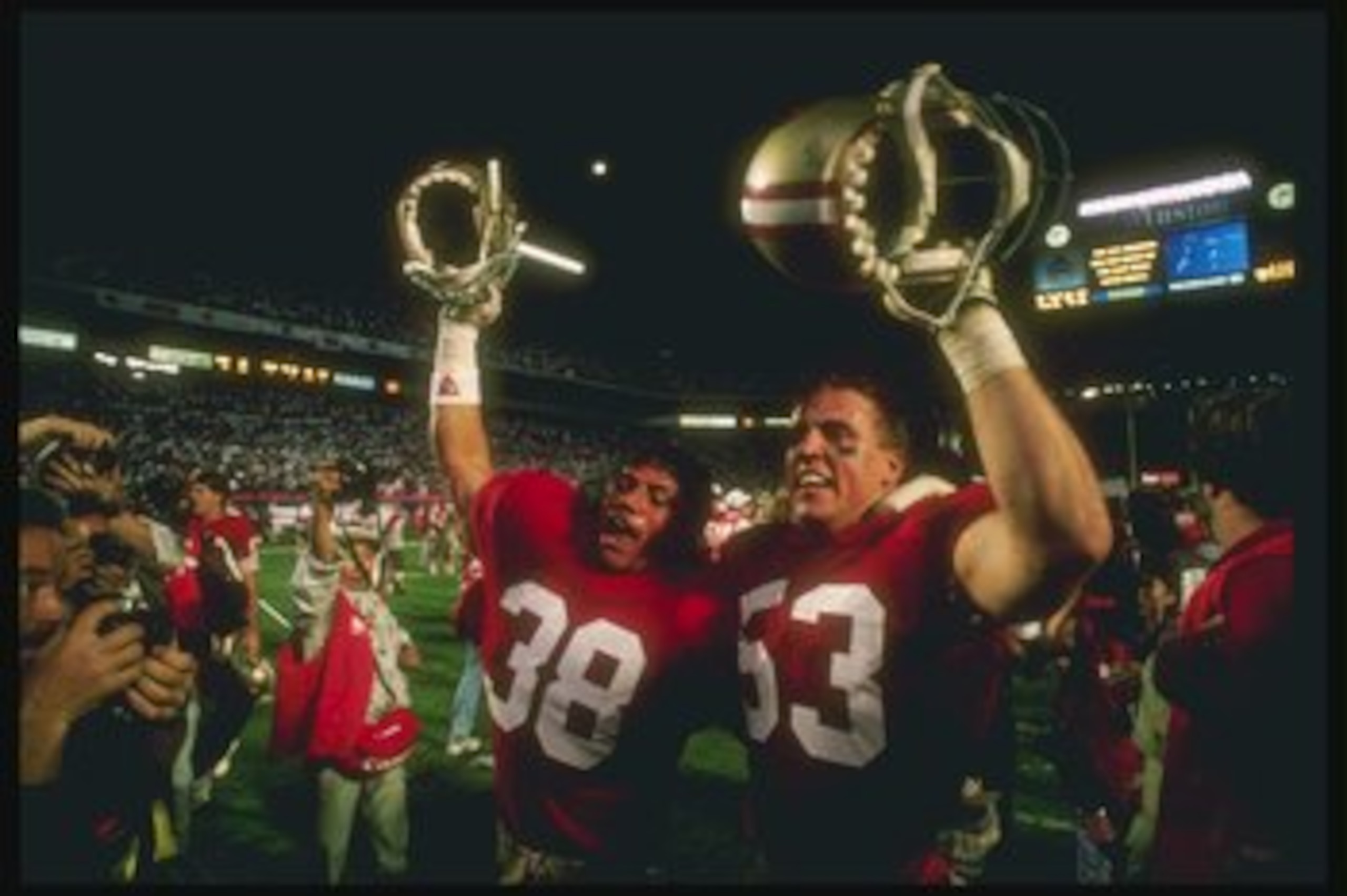 22 Jan 1989: San Francisco 49ers players celebrate during Super Bowl XXIII against the Cincinnati Bengals at Joe Robbie Stadium in Miami, Florida. The 49ers won the game, 20-16.
