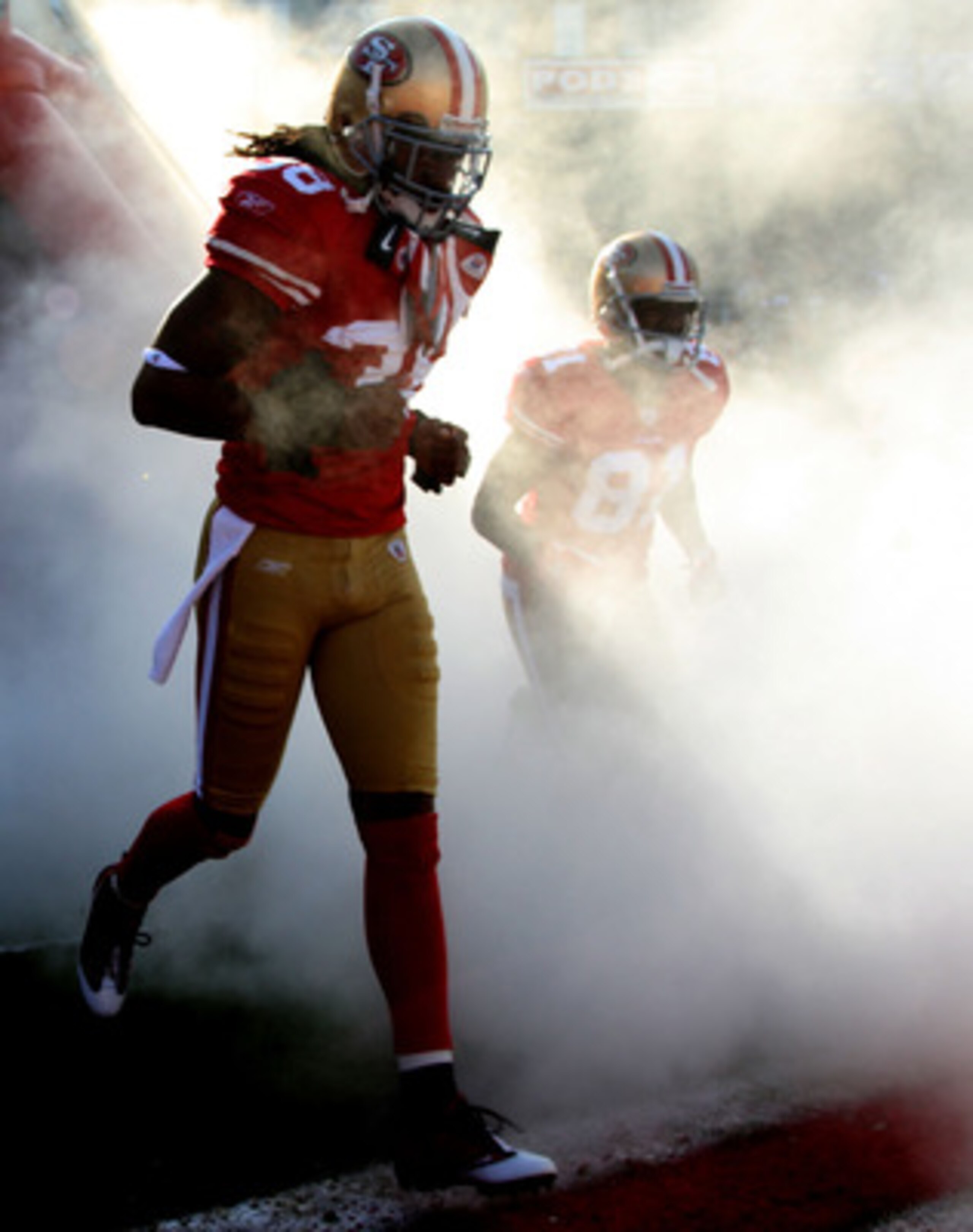 SAN FRANCISCO - DECEMBER 27: Dashon Goldson #38 and Brandon Jones #81 of the San Francisco 49ers are introduced against the Detroit Lions during an NFL game at Candlestick Park on December 27, 2009 in San Francisco, California.  (Photo by Jed Jacobsohn/Ge