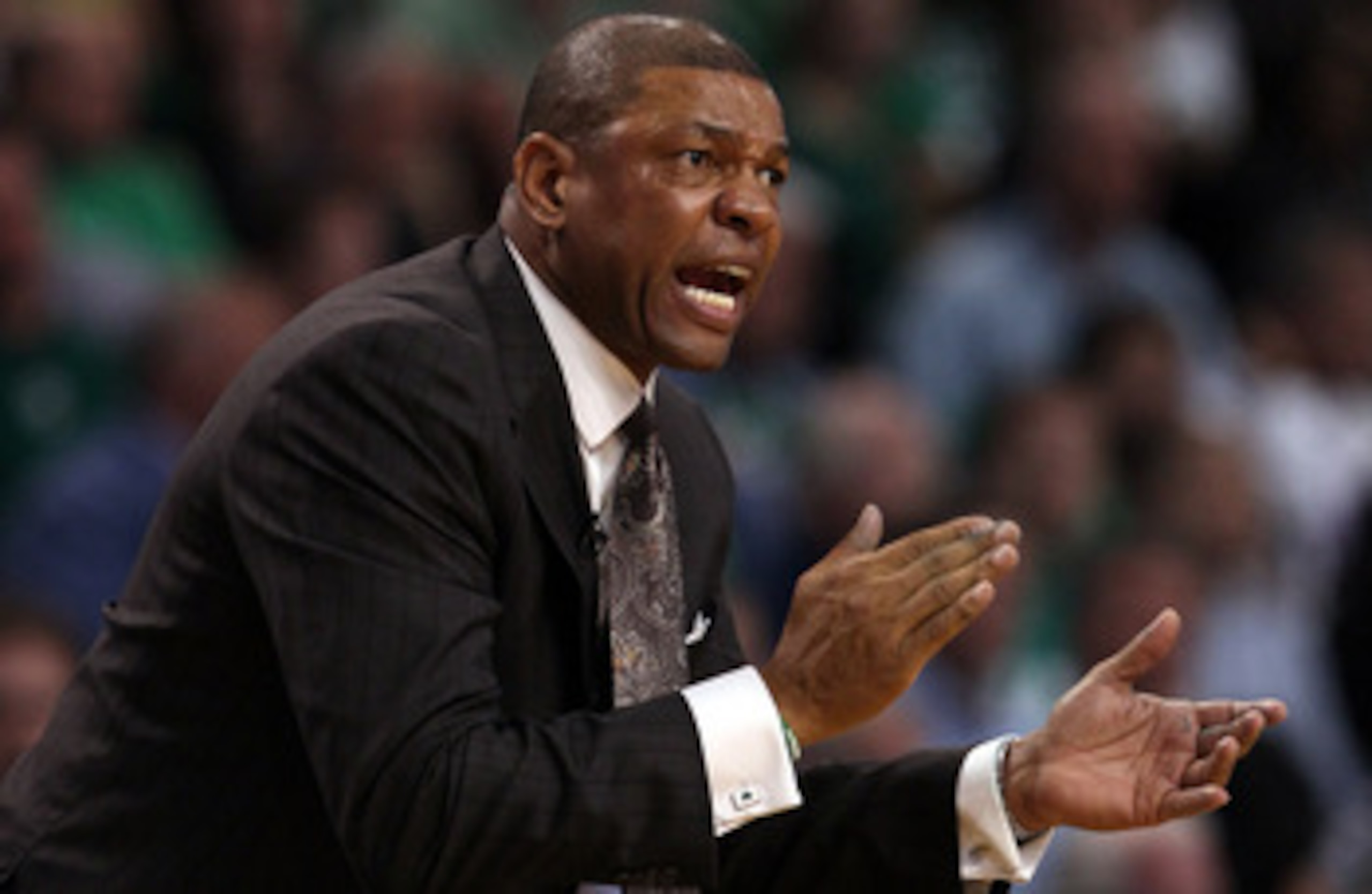 BOSTON, MA - MAY 09:  Head coach Doc Rivers of the Boston Celtics encourages his players in overtime against the Miami Heat in Game Four of the Eastern Conference Semifinals in the 2011 NBA Playoffs on May 9, 2011 at the TD Garden in Boston, Massachusetts