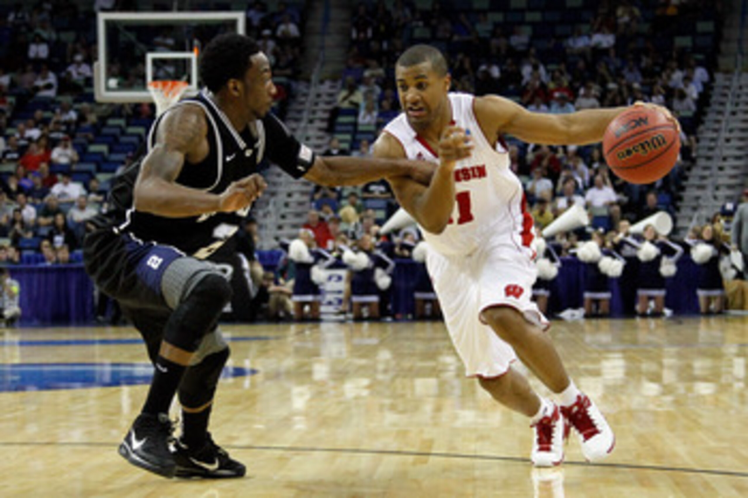 NEW ORLEANS, LA - MARCH 24:  Jordan Taylor #11 of the Wisconsin Badgers drives against Shawn Vanzant #2 of the Butler Bulldogs during the Southeast regional of the 2011 NCAA men's basketball tournament at New Orleans Arena on March 24, 2011 in New Orleans