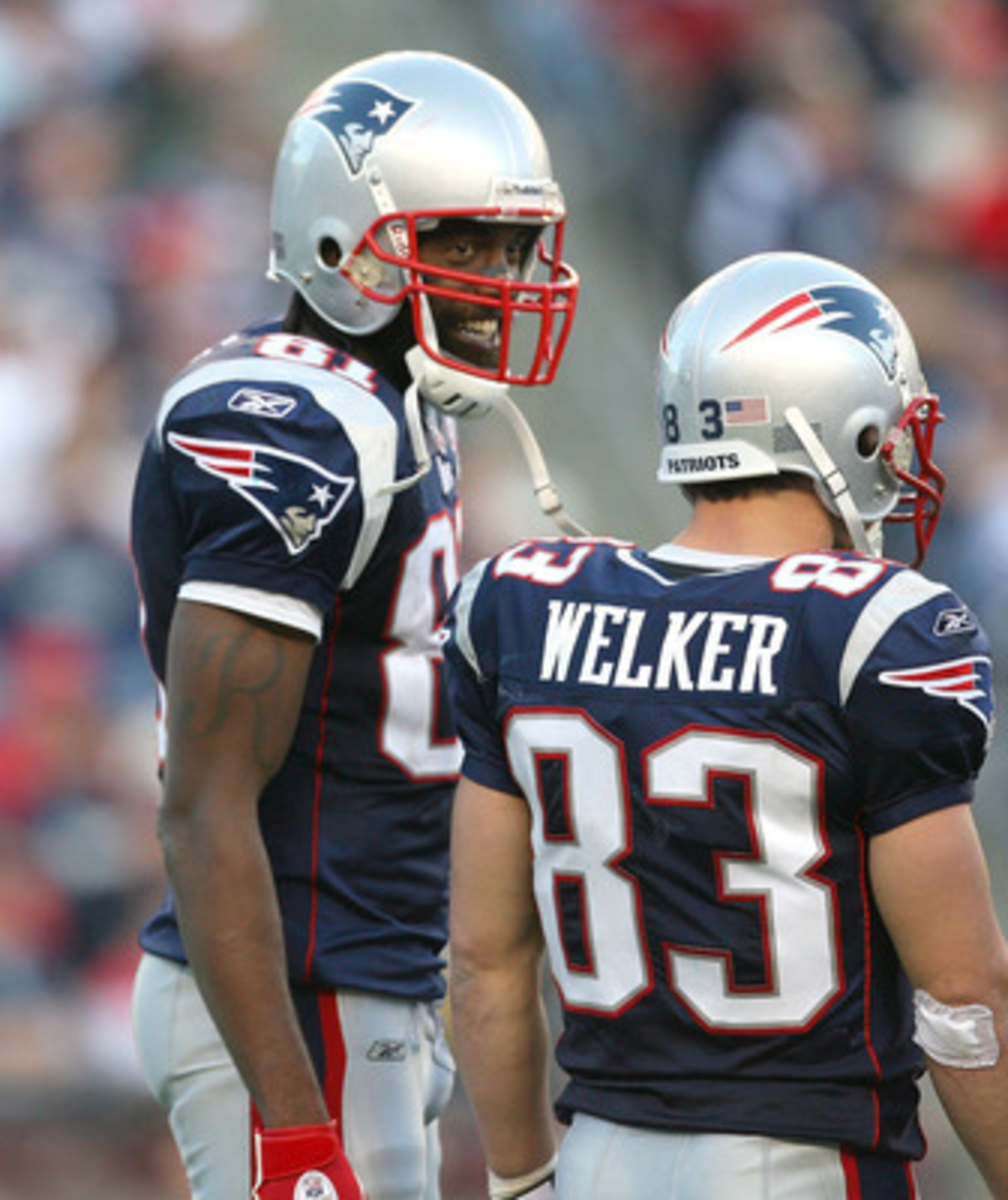 FOXBORO, MA - NOVEMBER 8:  Randy Moss #81 of the New England Patriots reacts with teammate Wes Welker #83 during a game against the Miami Dolphins at Gillette Stadium on November 8, 2009 in Foxboro, Massachusetts. The Patriots won 27-17. (Photo by Jim Rog