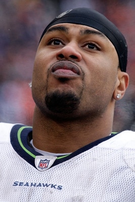 CHICAGO, IL - JANUARY 16:  Raheem Brock #98 of the Seattle Seahawks looks on late in the fourth quarter against the Chicago Bears in the 2011 NFC divisional playoff game at Soldier Field on January 16, 2011 in Chicago, Illinois.  (Photo by Andy Lyons/Gett