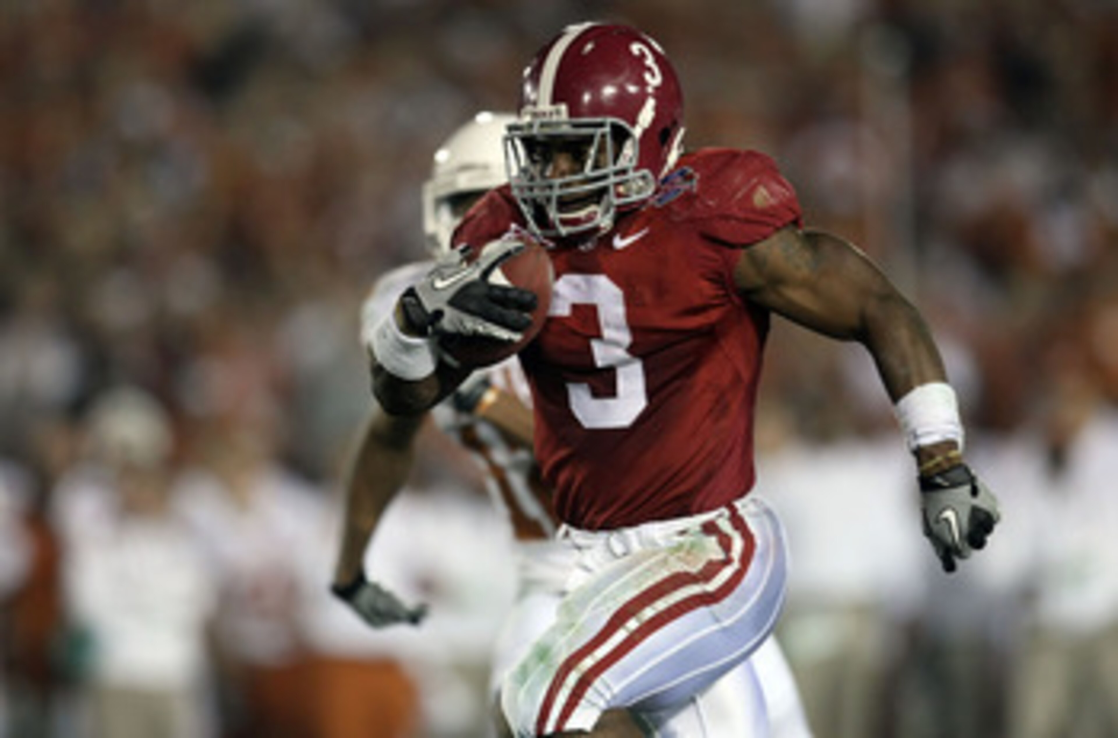 PASADENA, CA - JANUARY 07:  Running back Trent Richardson #3 of the Alabama Crimson Tide runs for a 49-yard touchdown against the Texas Longhorns in the second quarter of the Citi BCS National Championship game at the Rose Bowl on January 7, 2010 in Pasad