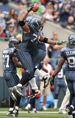 SEATTLE - SEPTEMBER 26:  Defensive end Red Bryant #79 of the Seattle Seahawks celebrates after recovering a fumble against the San Diego Chargers at Qwest Field on September 26, 2010 in Seattle, Washington. (Photo by Otto Greule Jr/Getty Images)