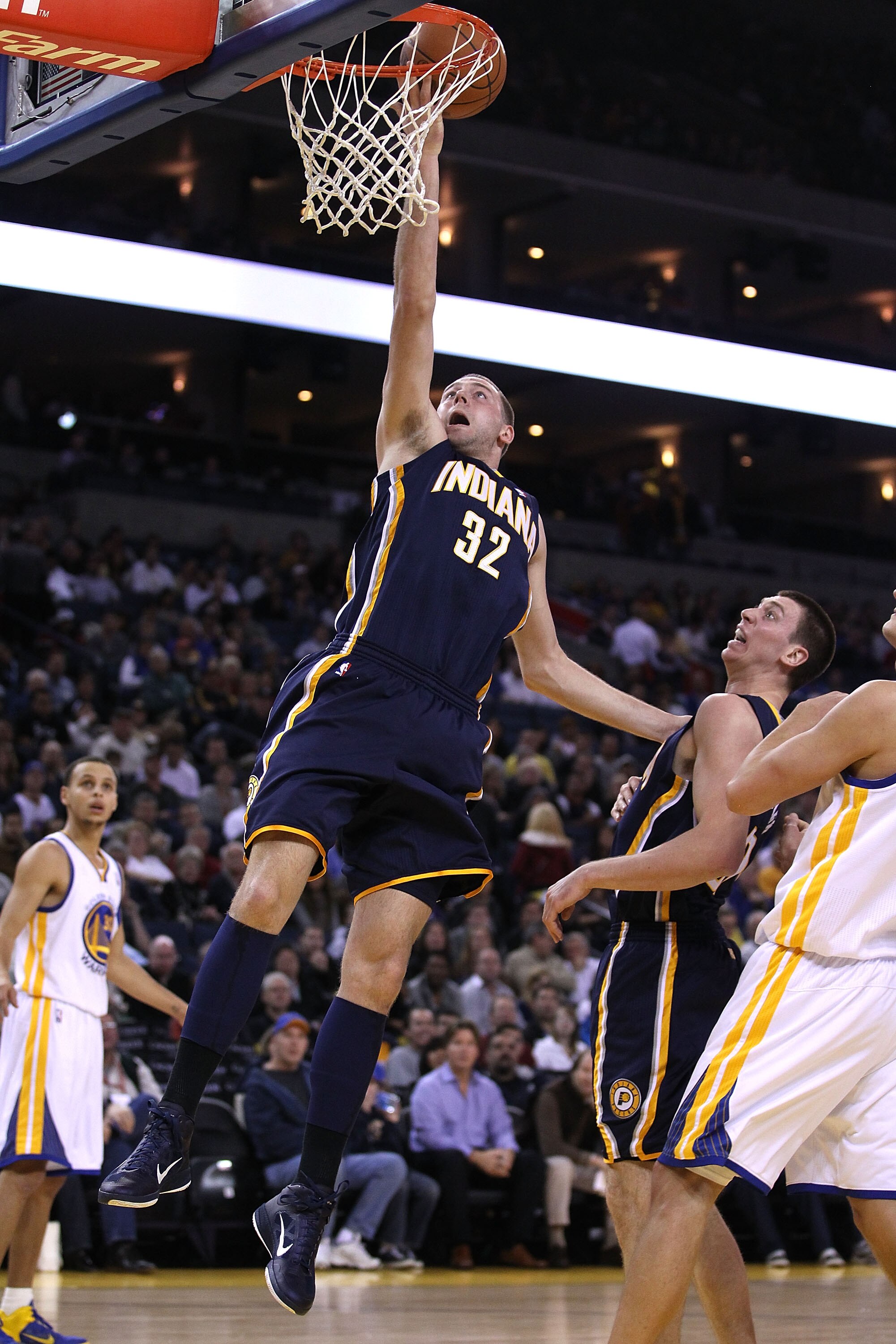 OAKLAND, CA - JANUARY 19:  Josh McRoberts #32 of the Indiana Pacers in action against the Golden State Warriors at Oracle Arena on January 19, 2011 in Oakland, California.  NOTE TO USER: User expressly acknowledges and agrees that, by downloading and or u