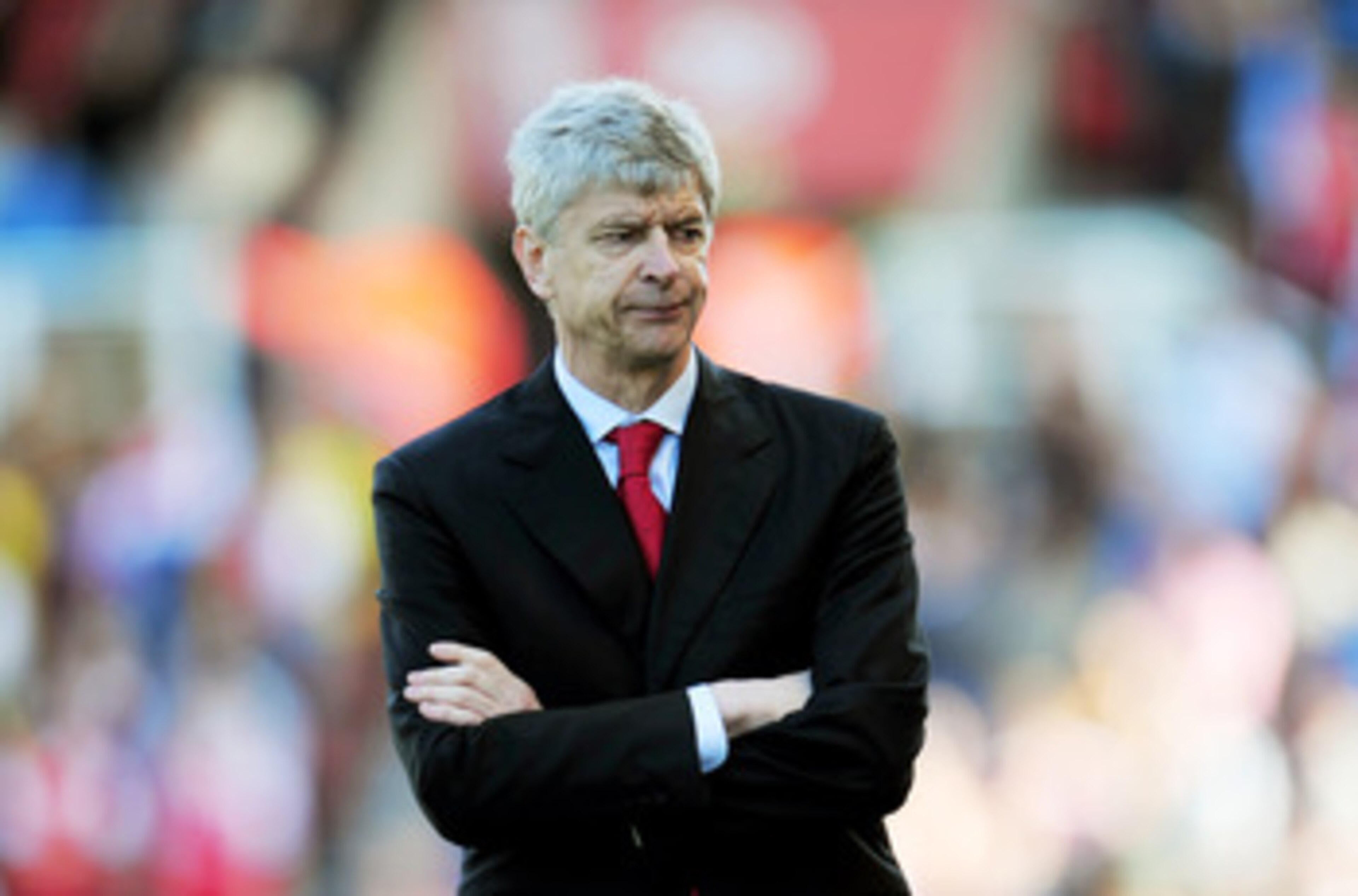 STOKE ON TRENT, ENGLAND - MAY 08: A dejected Arsene Wenger the Arsenal manager looks on as his team head towards a 3-1 defeat during the Barclays Premier League match between Stoke City and Arsenal at the Britannia Stadium on May 8, 2011 in Stoke on Tren STOKE ON TRENT, ENGLAND - MAY 08: A dejected Arsene Wenger the Arsenal manager looks on as his team head towards a 3-1 defeat during the Barclays Premier League match between Stoke City and Arsenal at the Britannia Stadium on May 8, 2011 in Stoke on Tren
