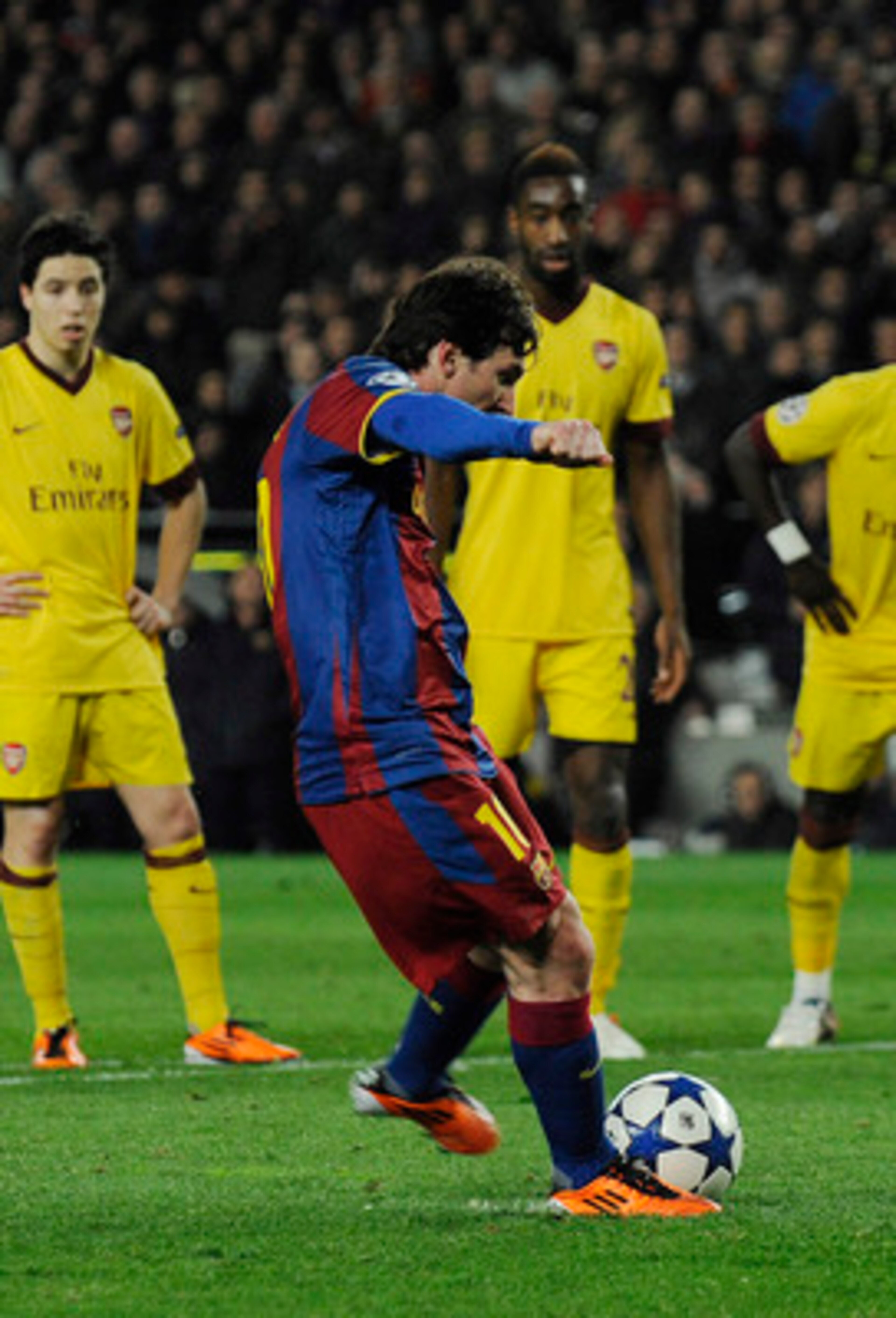 BARCELONA, SPAIN - MARCH 08: Lionel Messi of FC Barcelona (C) scores his second goal during the UEFA Champions League round of 16 second leg match between Barcelona and Arsenal at the Camp Nou stadium on March 8, 2011 in Barcelona, Spain. Barcelona won 3 BARCELONA, SPAIN - MARCH 08: Lionel Messi of FC Barcelona (C) scores his second goal during the UEFA Champions League round of 16 second leg match between Barcelona and Arsenal at the Camp Nou stadium on March 8, 2011 in Barcelona, Spain. Barcelona won 3