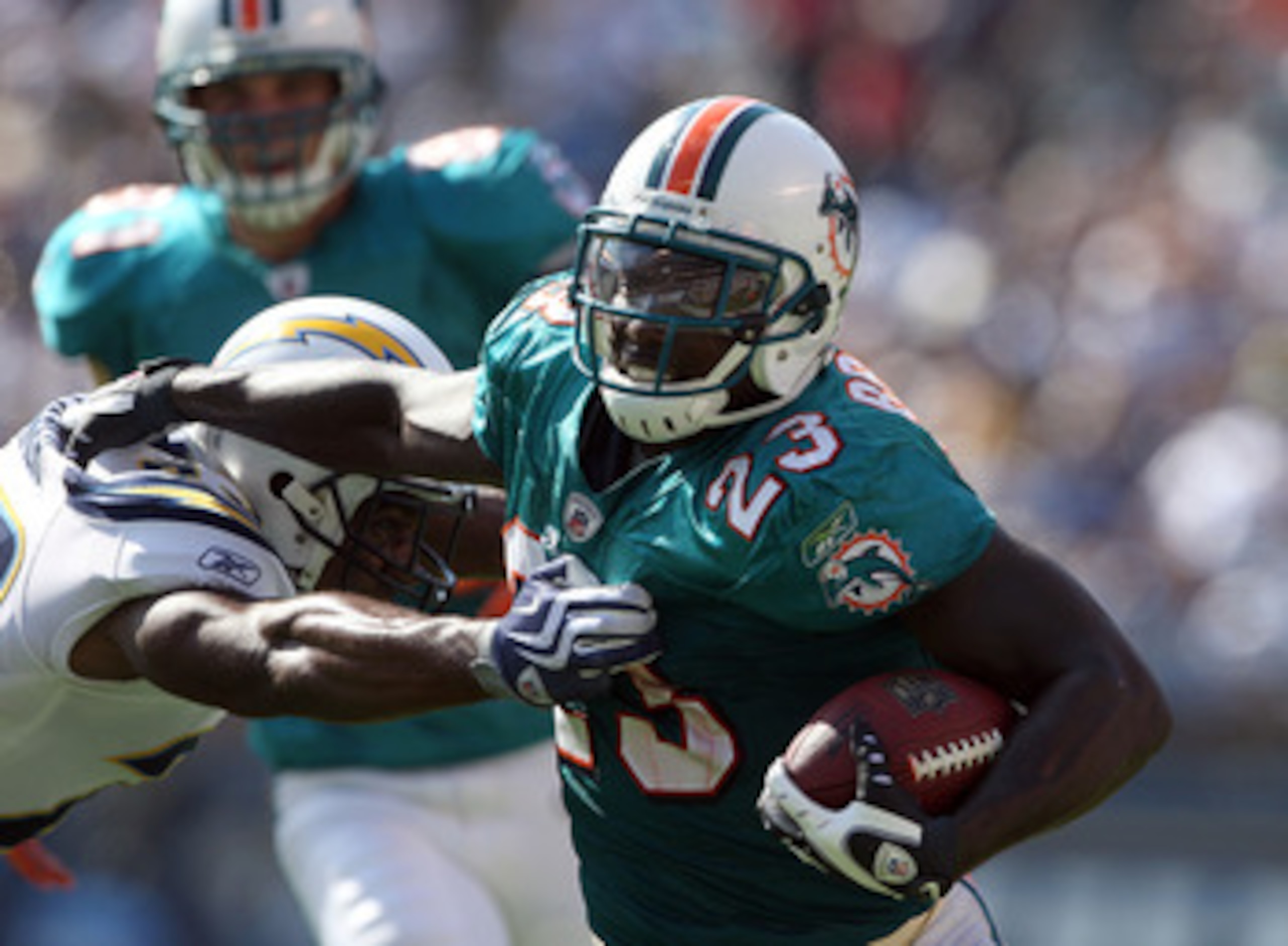 SAN DIEGO, CA - SEPTEMBER 27: Running back Ronnie Brown #23 of the Miami Dolphins runs with the ball against the San Diego Chargers at Qualcomm Stadium on September 27, 2009 in San Diego, California. (Photo by Donald Miralle/Getty Images)