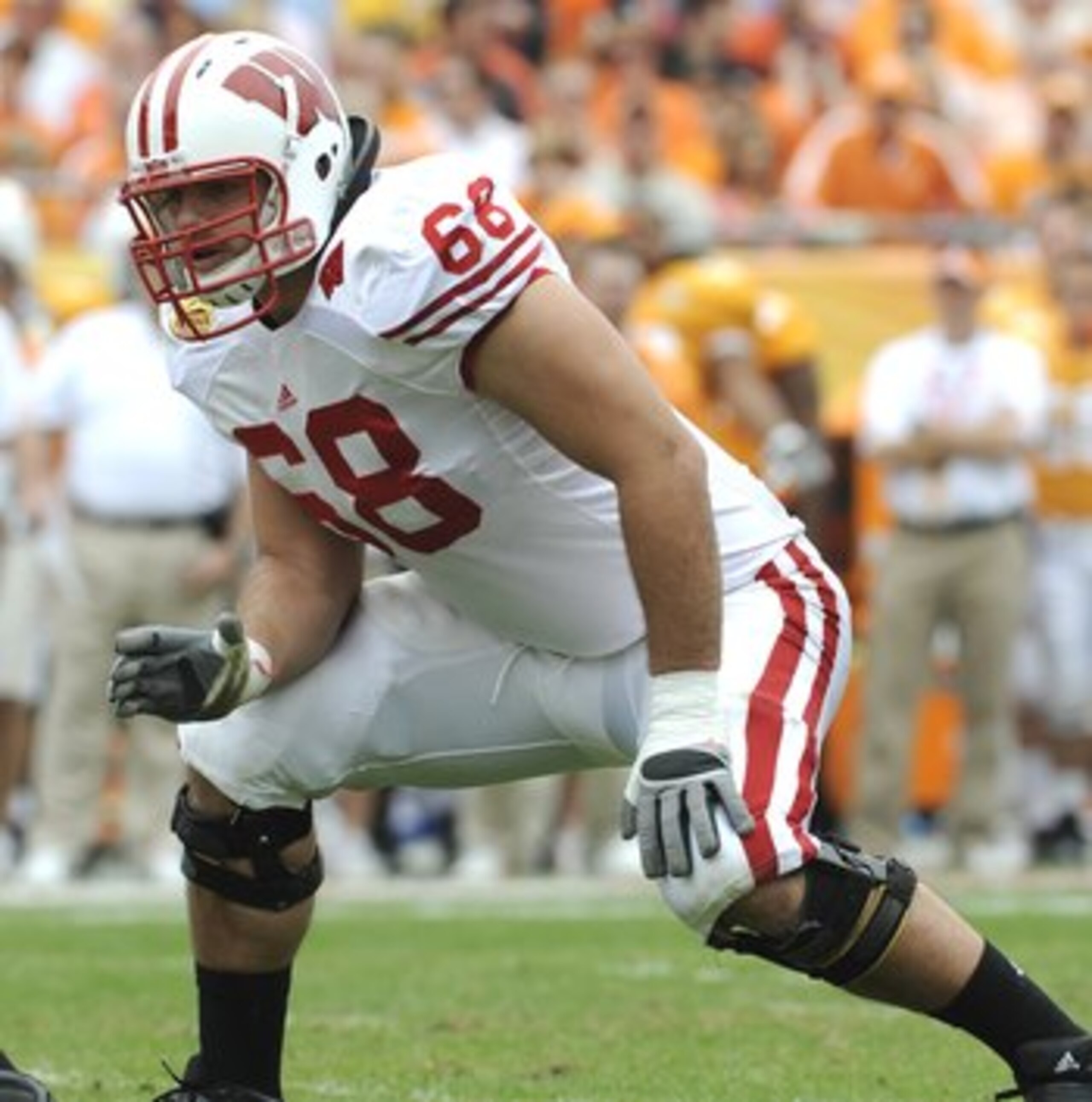 TAMPA, FL -  JANUARY 1: Lineman Gabe Carimi #68 of the Wisconsin Badgers sets to block  against the Tennessee Volunteers in the 2008 Outback Bowl at Raymond James Stadium on January 1, 2008 in Tampa, Florida.  The Volunteers won 21 - 17. (Photo by Al Mess