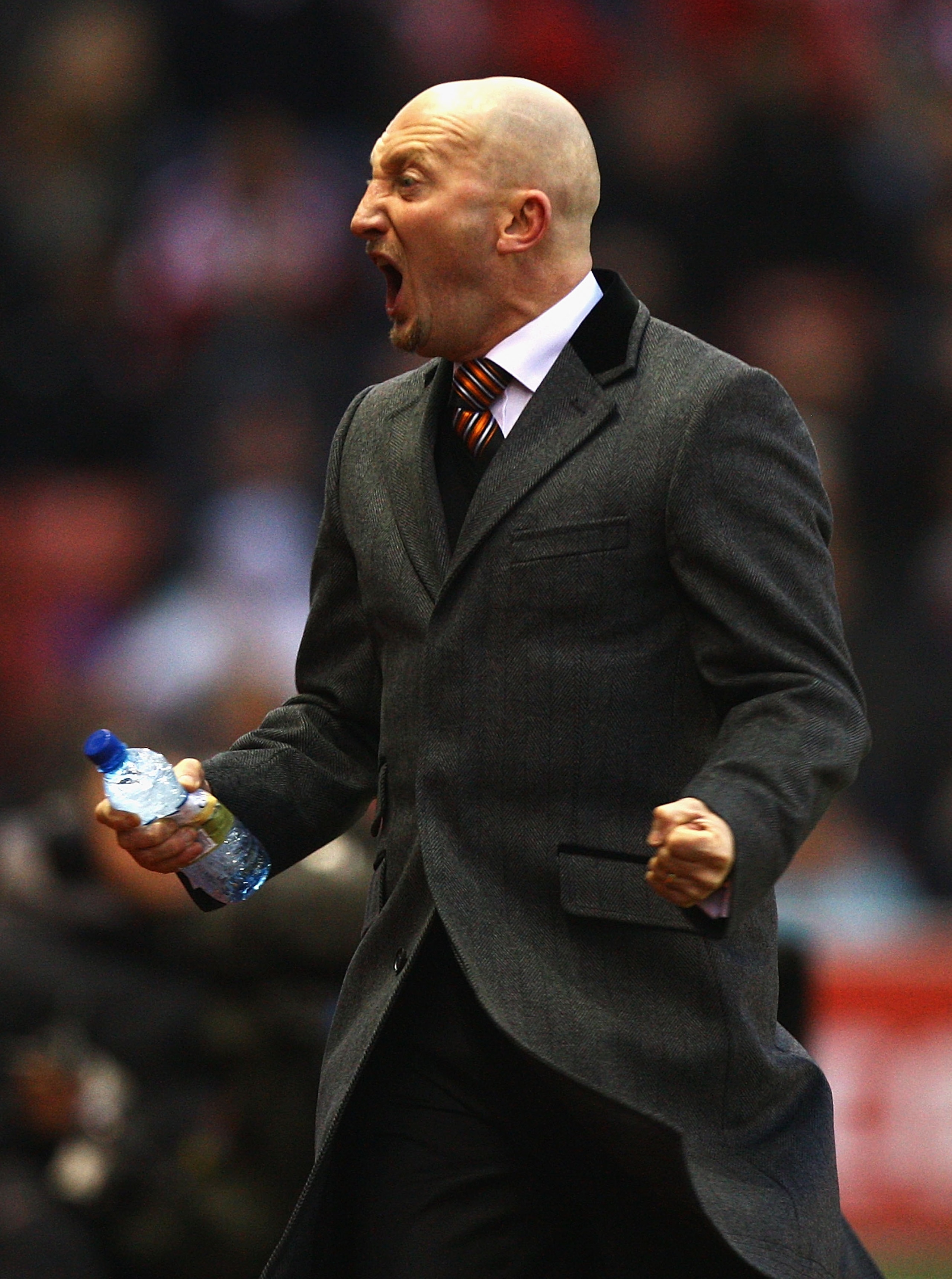 STOKE ON TRENT, ENGLAND - DECEMBER 11:  Ian Holloway, manager of Blackpool shows his frustration  during the Barclays Premier League match between Stoke City and Blackpool at Britannia Stadium on December 11, 2010 in Stoke on Trent, England.  (Photo by Ma