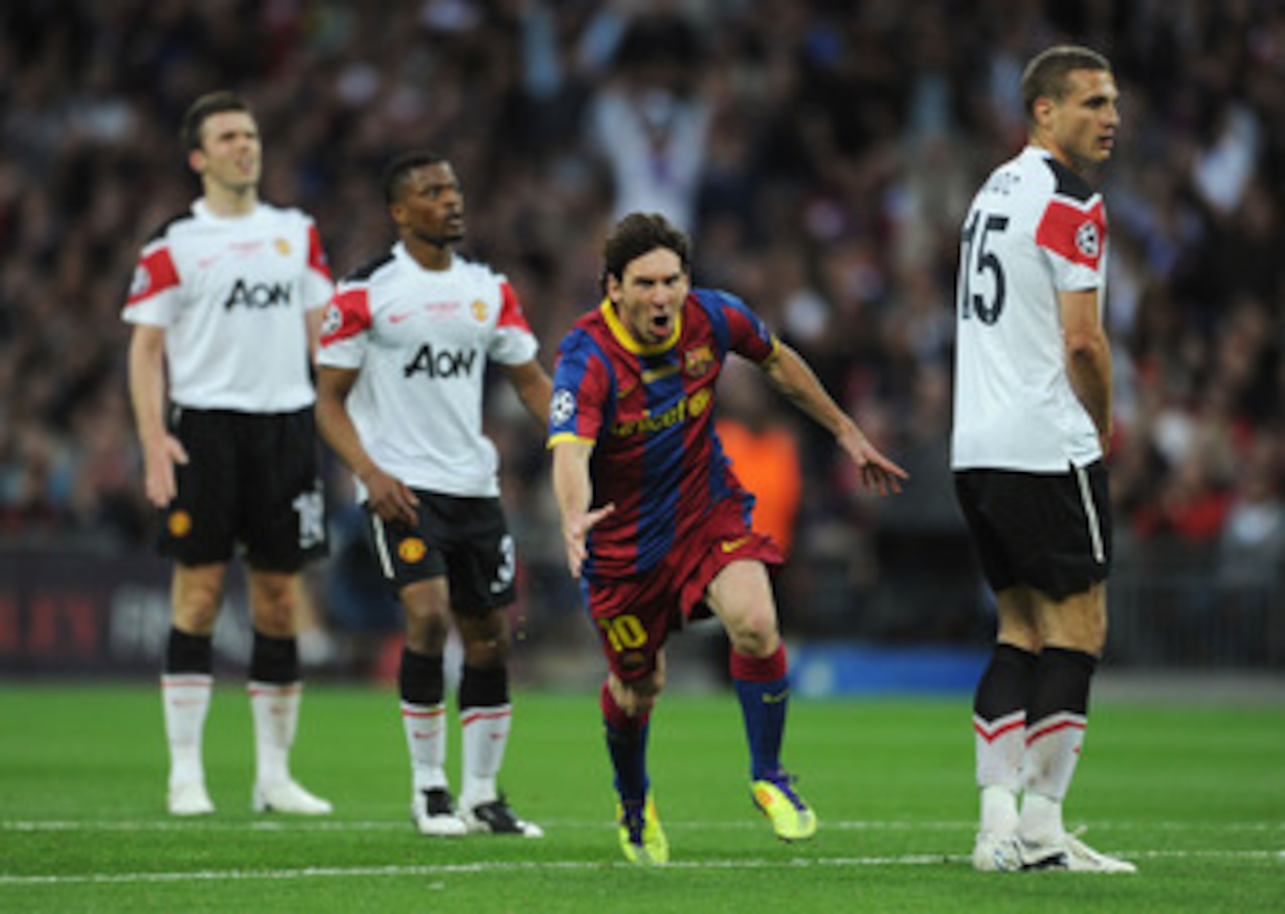 LONDON, ENGLAND - MAY 28:  Lionel Messi of FC Barcelona (2L) celebrates scoring his teams second goal during the UEFA Champions League final between FC Barcelona and Manchester United FC at Wembley Stadium on May 28, 2011 in London, England.  (Photo by Ja