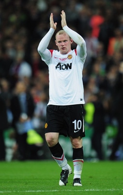 LONDON, ENGLAND - MAY 28:  Wayne Rooney of Manchester United applauds the fans after defeat during the UEFA Champions League final between FC Barcelona and Manchester United FC at Wembley Stadium on May 28, 2011 in London, England.  (Photo by Shaun Botter