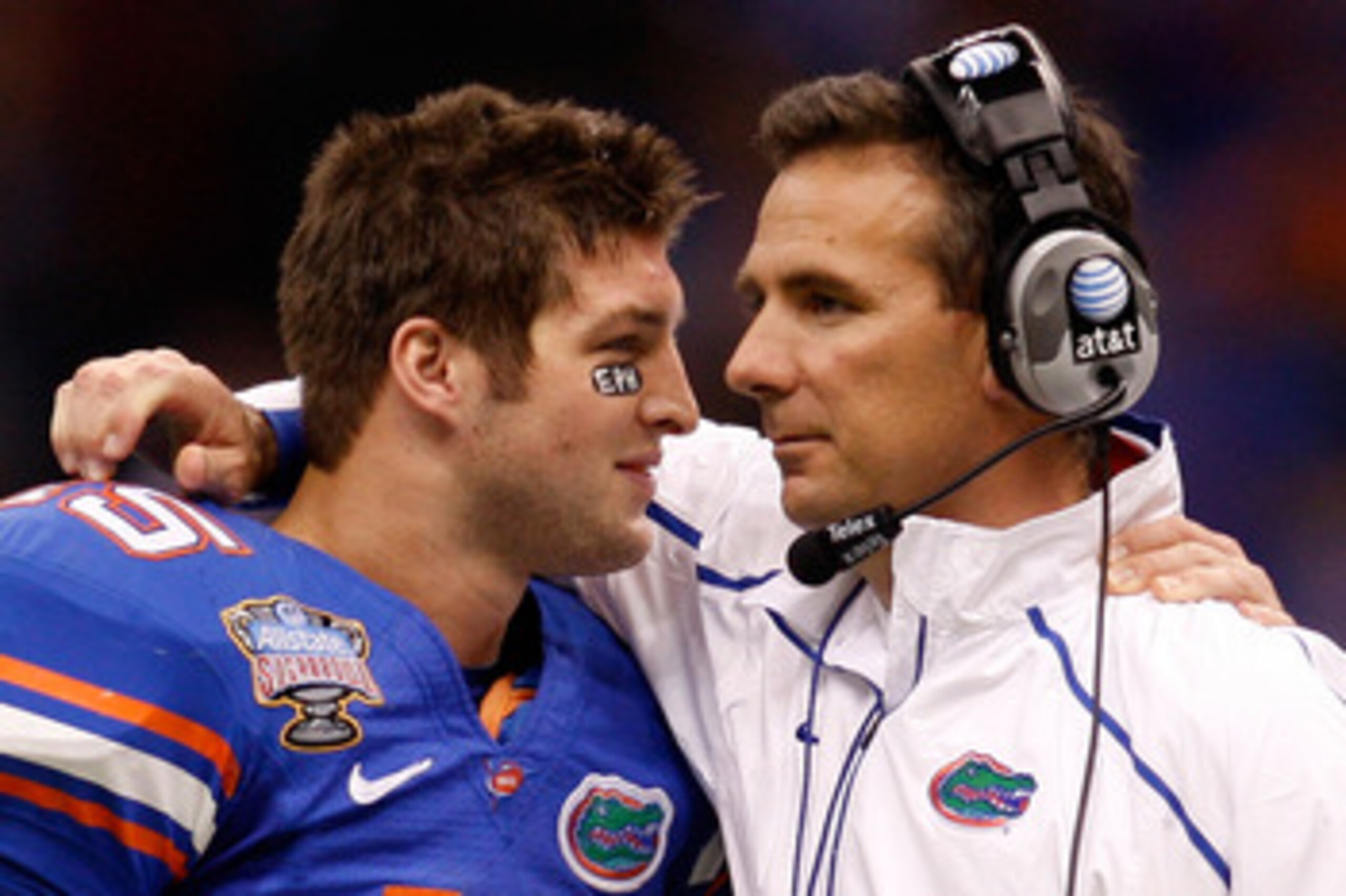 NEW ORLEANS - JANUARY 01:  Tim Tebow #15 of the Florida Gators hugs his head coach Urban Meyer after scoring a touchdown against the Cincinnati Bearcats during the Allstate Sugar Bowl at the Louisana Superdome on January 1, 2010 in New Orleans, Louisiana.