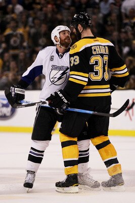 BOSTON, MA - MAY 23:  Ryan Malone #6 of the Tampa Bay Lightning and Zdeno Chara #33 of the Boston Bruins exchange words in Game Five of the Eastern Conference Finals during the 2011 NHL Stanley Cup Playoffs at TD Garden on May 23, 2011 in Boston, Massachu