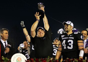 PASADENA, CA - JANUARY 01:  Head coach Gary Patterson of the TCU Horned Frogs holds the Rose Bowl Championship Trophy after defeating the Wisconsin Badgers 21-19 in the 97th Rose Bowl game on January 1, 2011 in Pasadena, California.  (Photo by Jeff Gross/