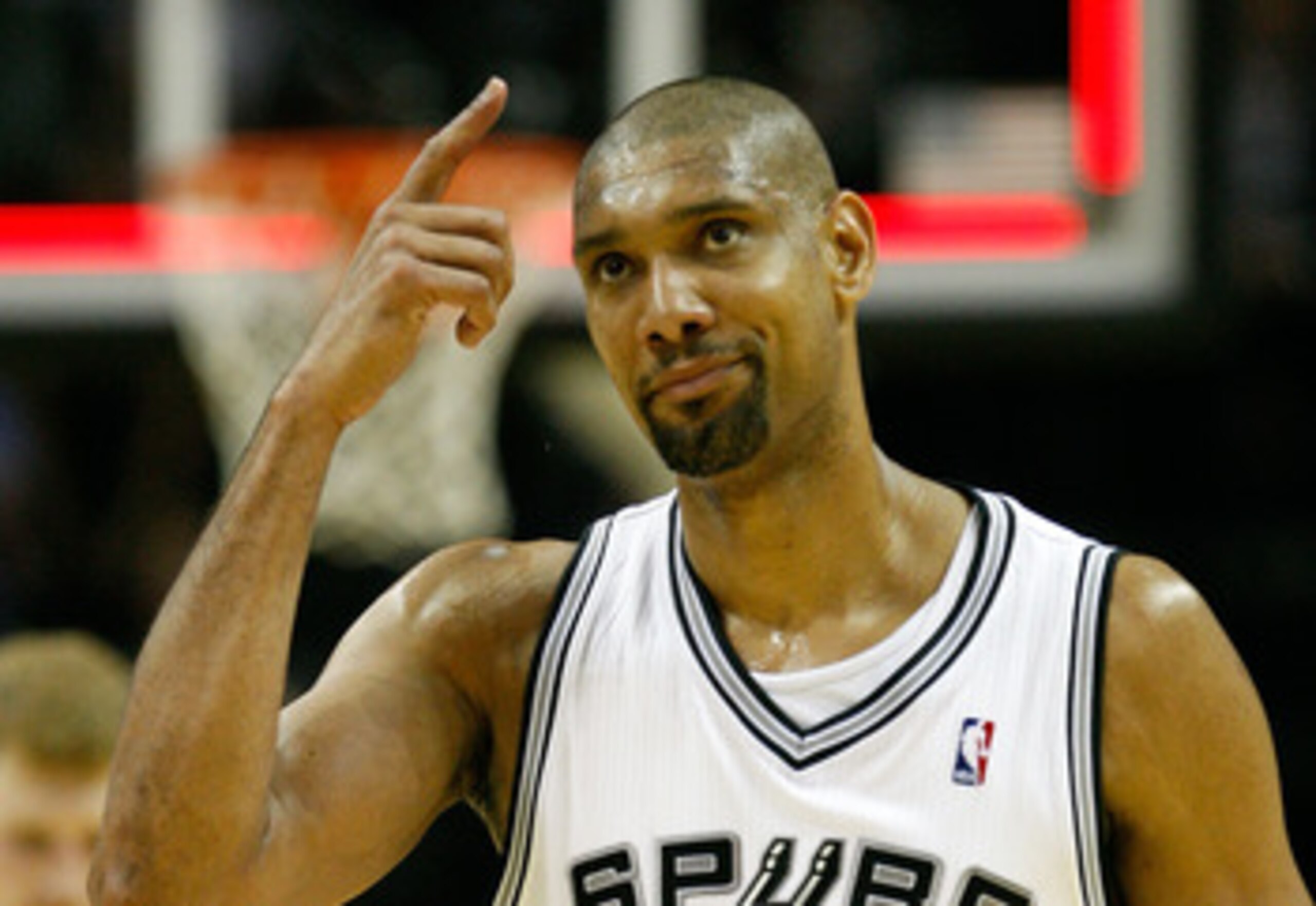 SAN ANTONIO, TX - APRIL 17: Forward Tim Duncan #21 of the San Antonio Spurs reacts against the Memphis Grizzlies in Game One of the Western Conference Quarterfinals in the 2011 NBA Playoffs on April 17, 2011 at AT&T Center in San Antonio, Texas. NOTE TO SAN ANTONIO, TX - APRIL 17: Forward Tim Duncan #21 of the San Antonio Spurs reacts against the Memphis Grizzlies in Game One of the Western Conference Quarterfinals in the 2011 NBA Playoffs on April 17, 2011 at AT&T Center in San Antonio, Texas. NOTE TO